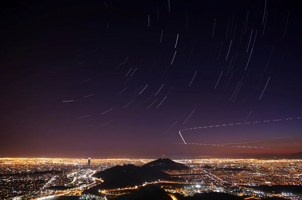 .1 Notice how even above the city, there is still an area of haze that cancels out a ton of the stars. Only the brightest stars can be seen and even then, they're dim and few in number  Flickr