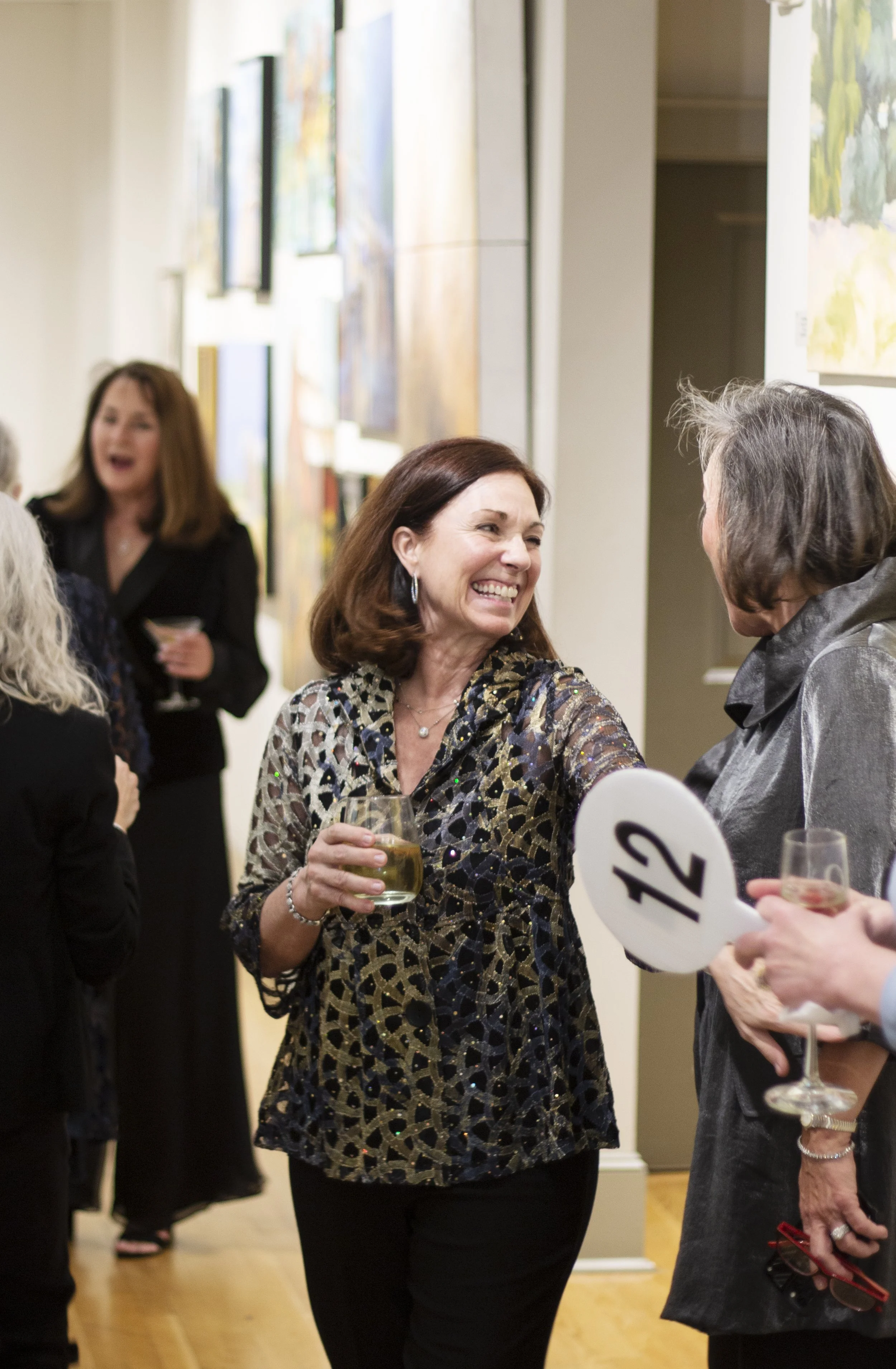 Photography captured at Quinlan Visual Arts Centers 45th Annual Gala Auction event by Justin Johnson of Ingeniusart.