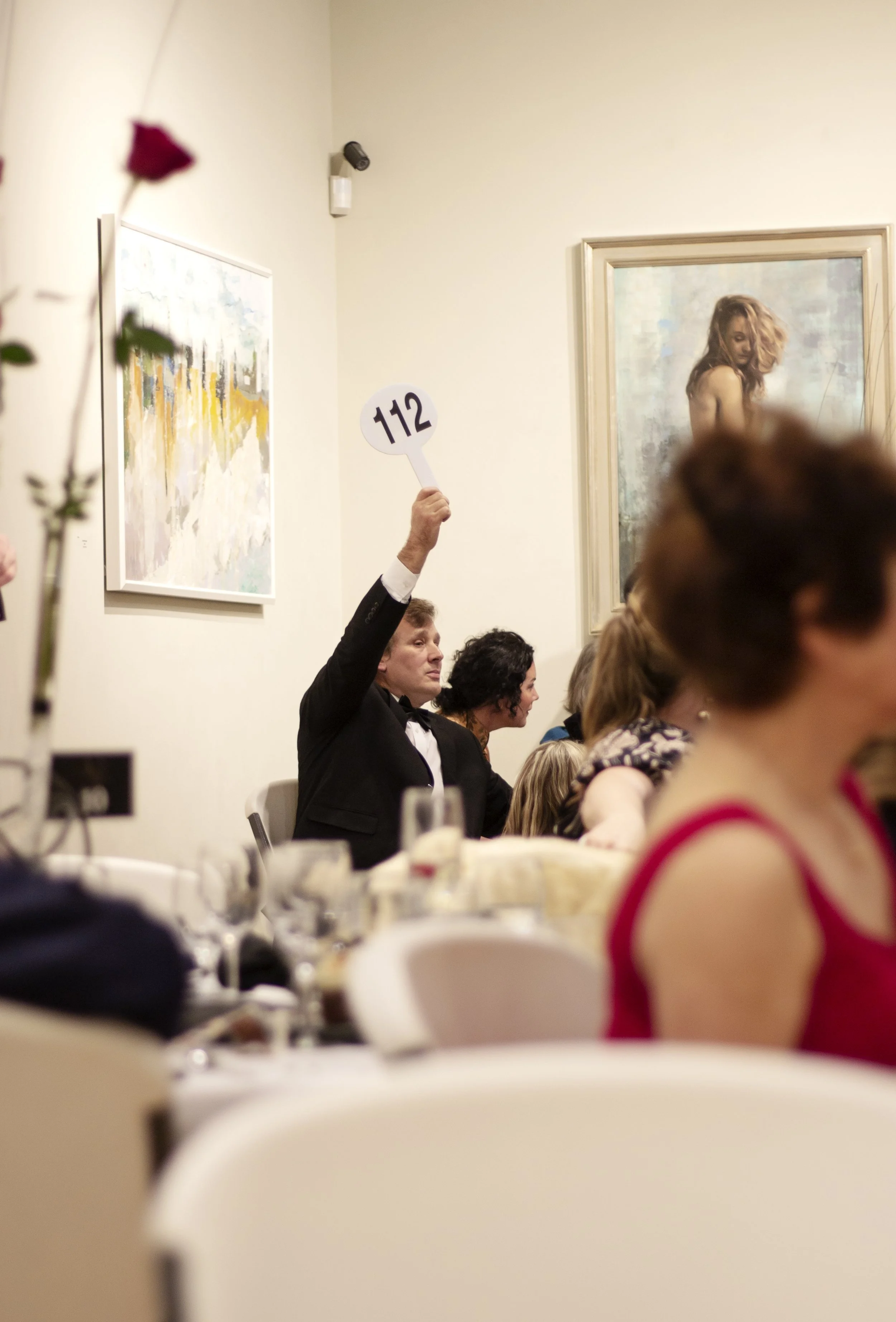 A captivating image from the highly anticipated Quinlan Visual Arts Center 45th Annual Gala Auction event photography by Justin Johnson of Ingeniusart.