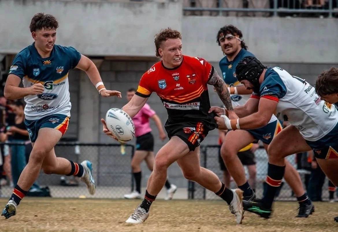 Ryan playing rugby league