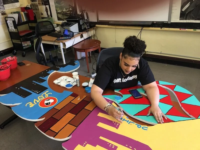 Vee adds finishing touches to the Uplift Eagle.