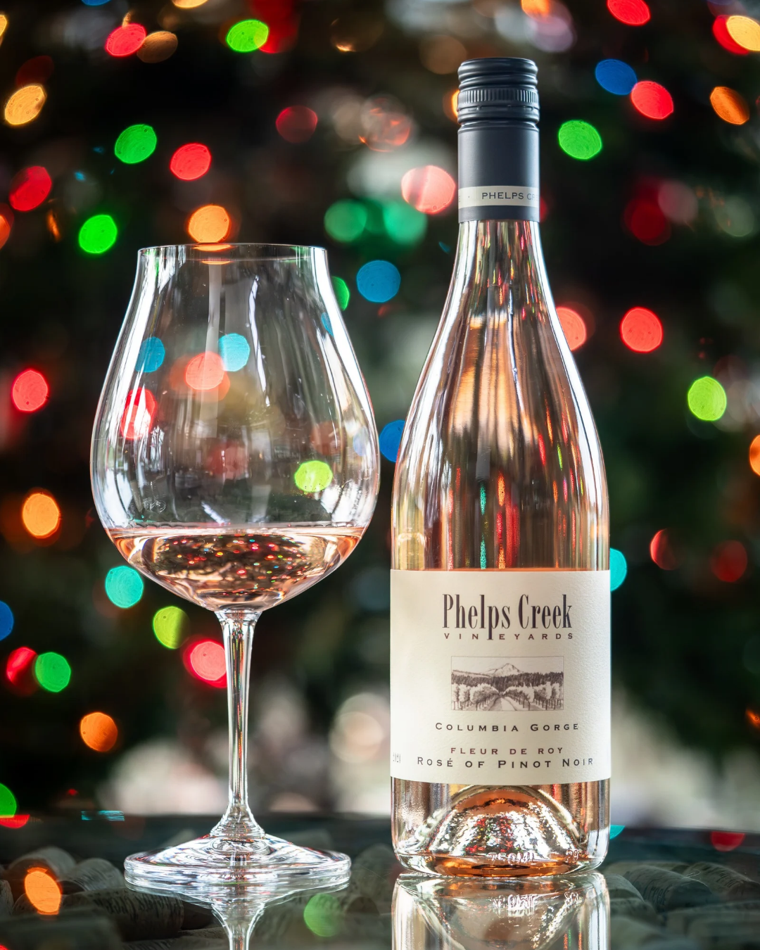 Bottle and glass of Fleur De Roy Rosé