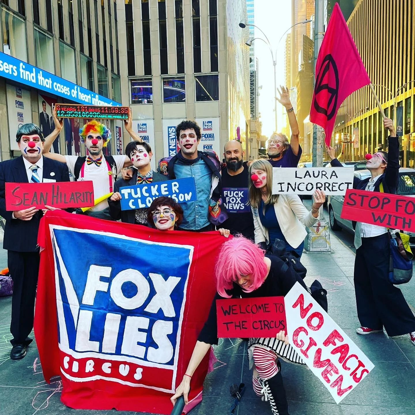 As Fox makes a mockery of news, activists stage circus to make a mockery of Fox