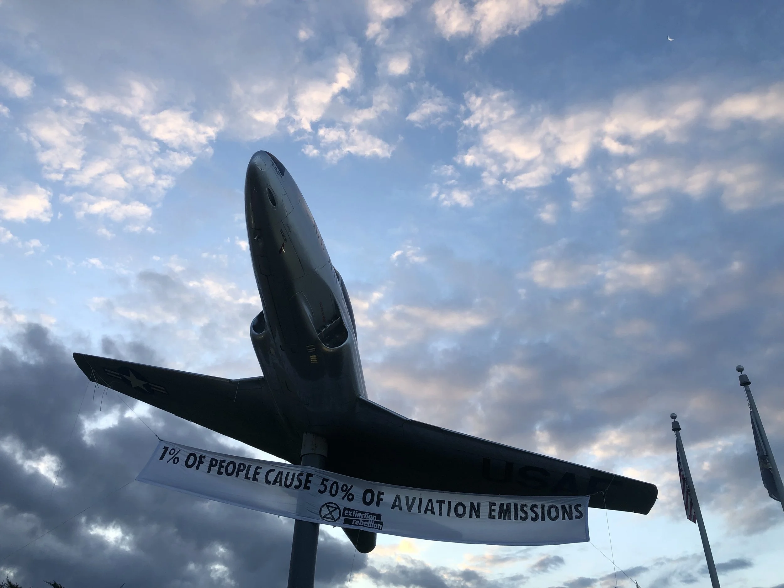 CLIMATE ACTIVISTS CALL ATTENTION TO LUXURY CARBON CONSUMPTION