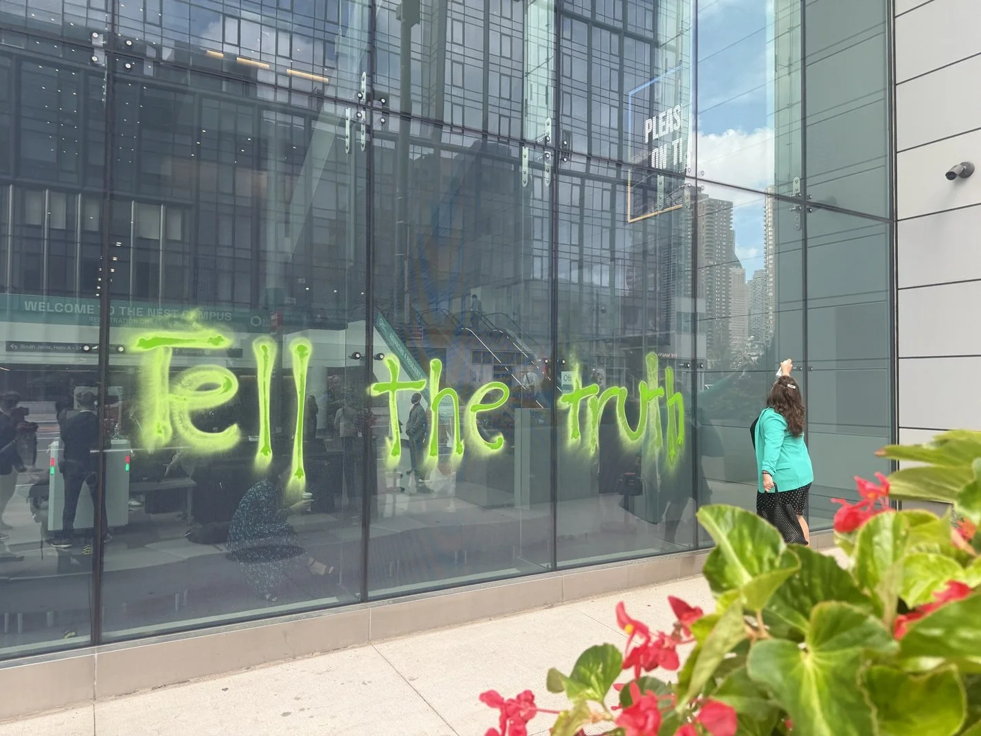  ACTIVISTS DISRUPT AI GREENWASHING PRESENTATION AT NEST CONFERENCE