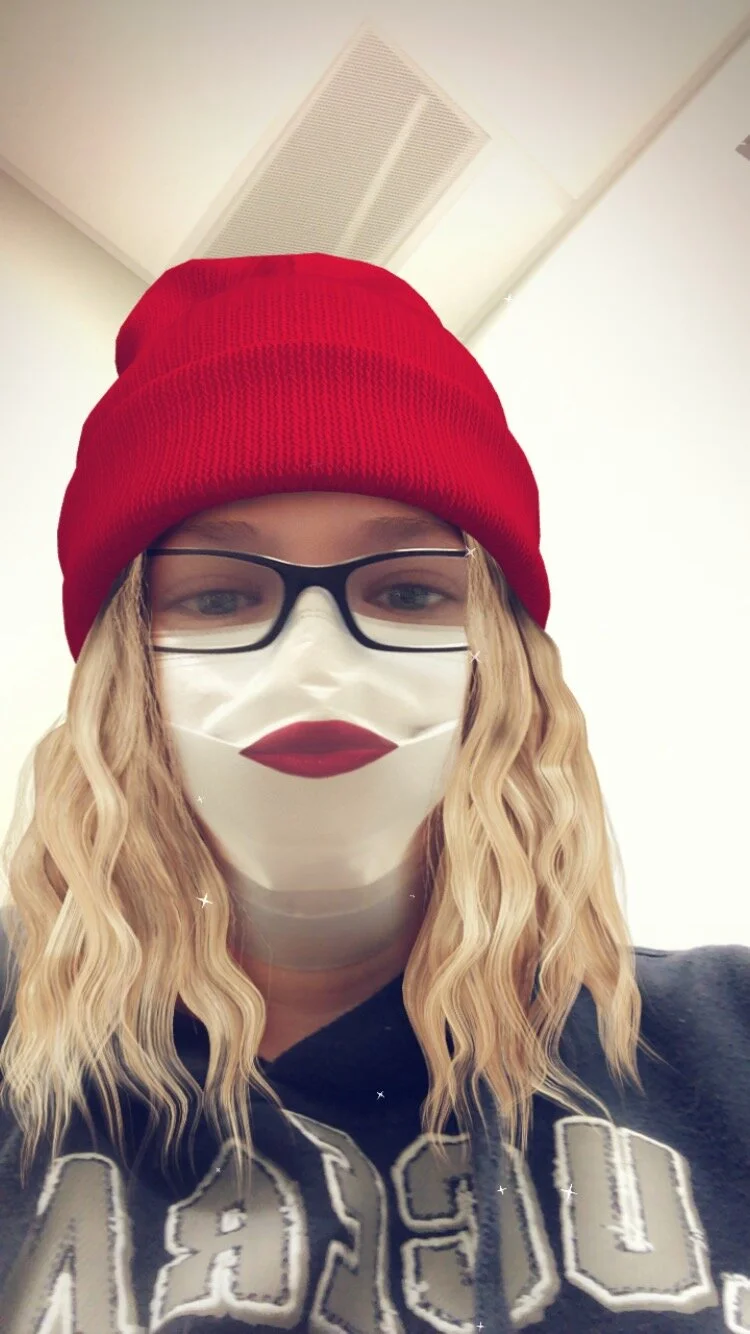 Playing with filters while I waited in urgent care through many people trying to get tested and helped. The filter put lips over my mask.