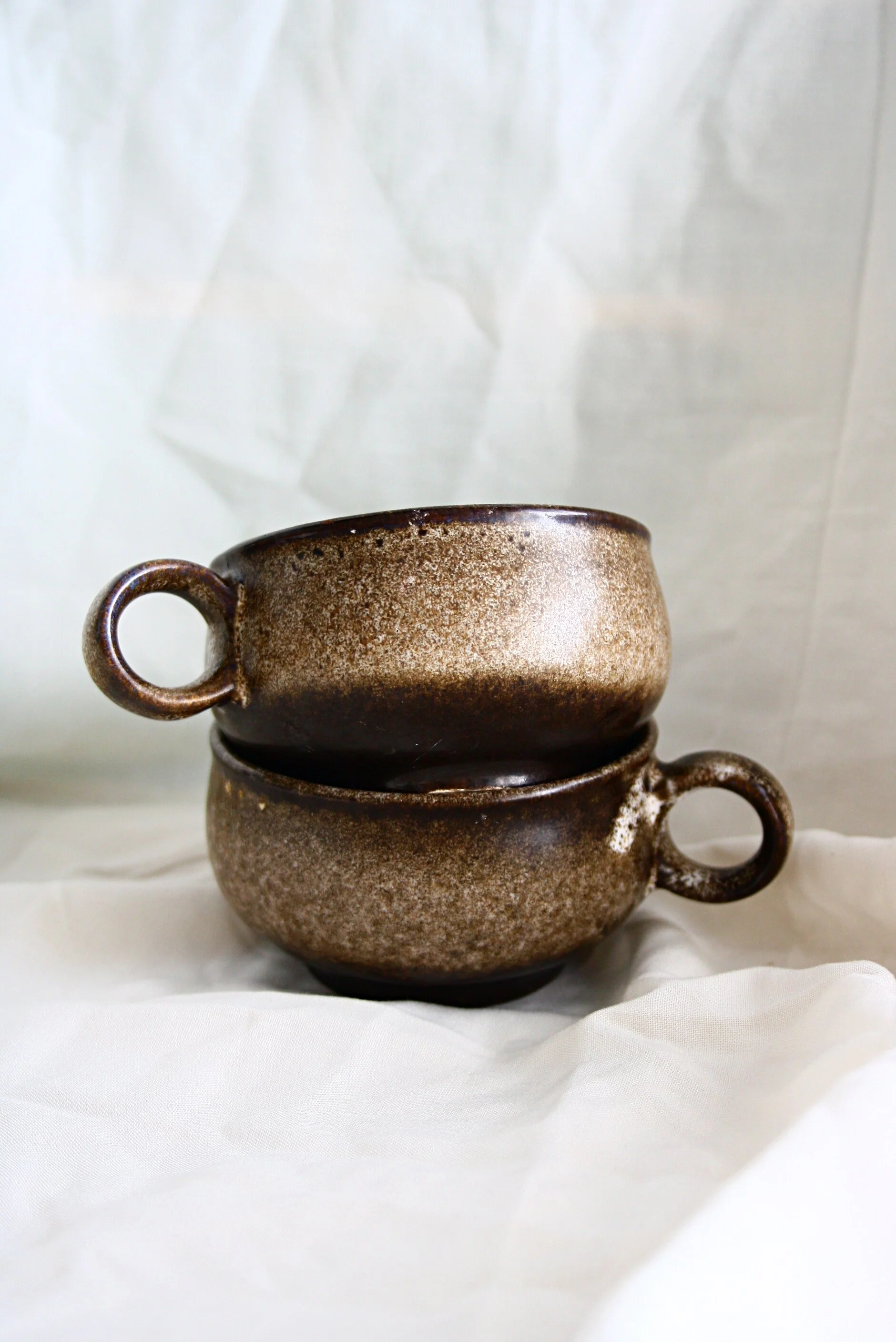 brown speckled flat mugs