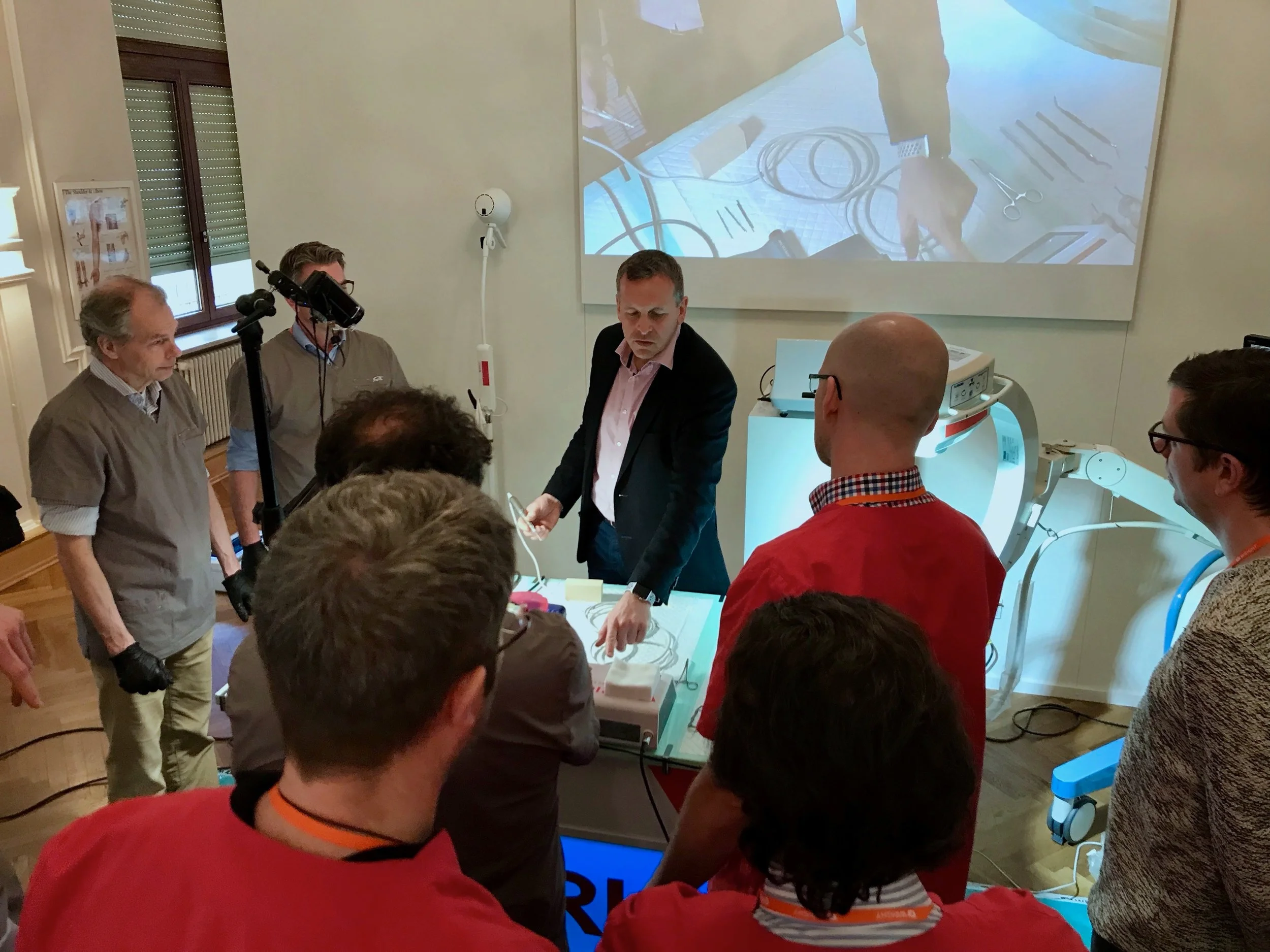 Mr Redfern training surgeons at his course in Germany