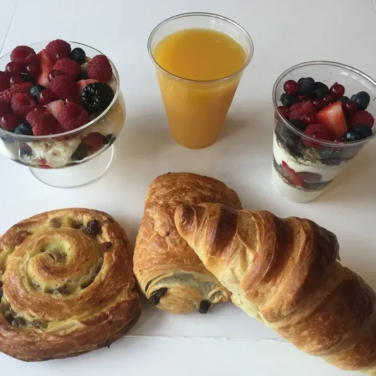 Assorted pastries, orange juice & greek yogurt pot