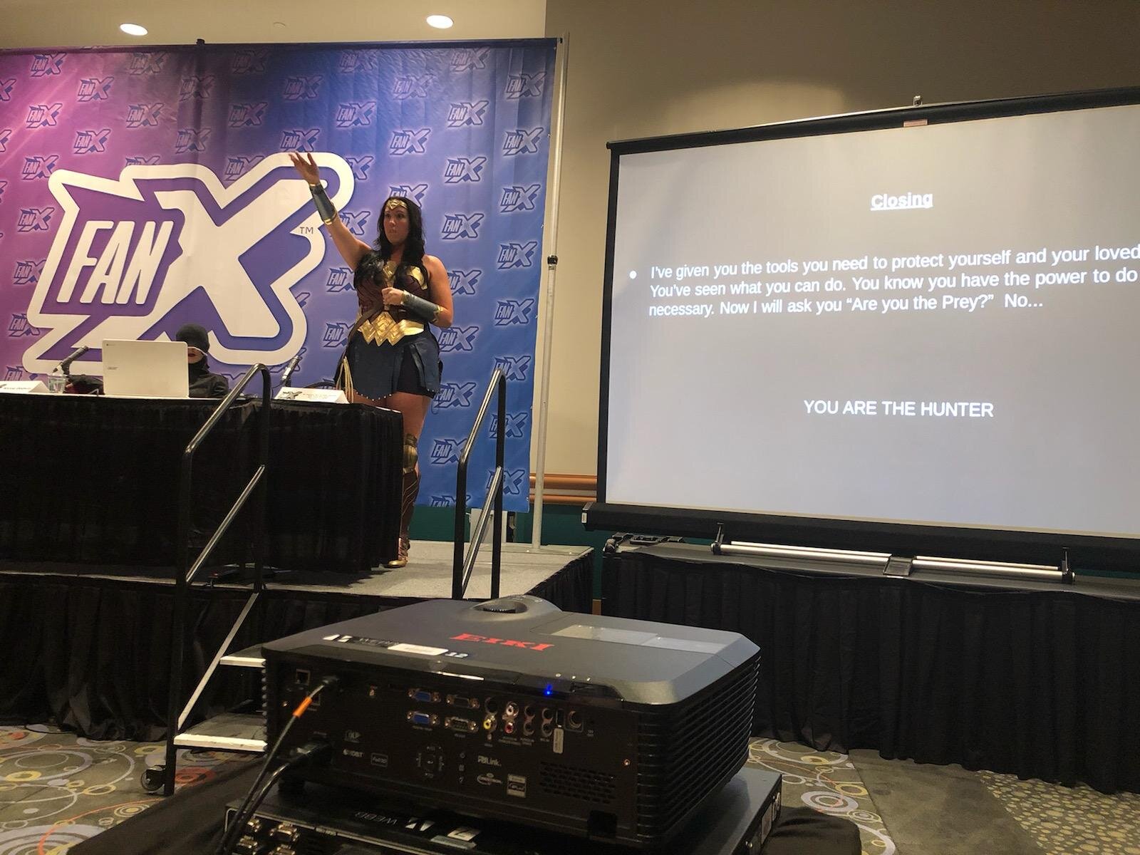Alyssa cosplaying Wonder Woman teaches behavioral profiling at FanX