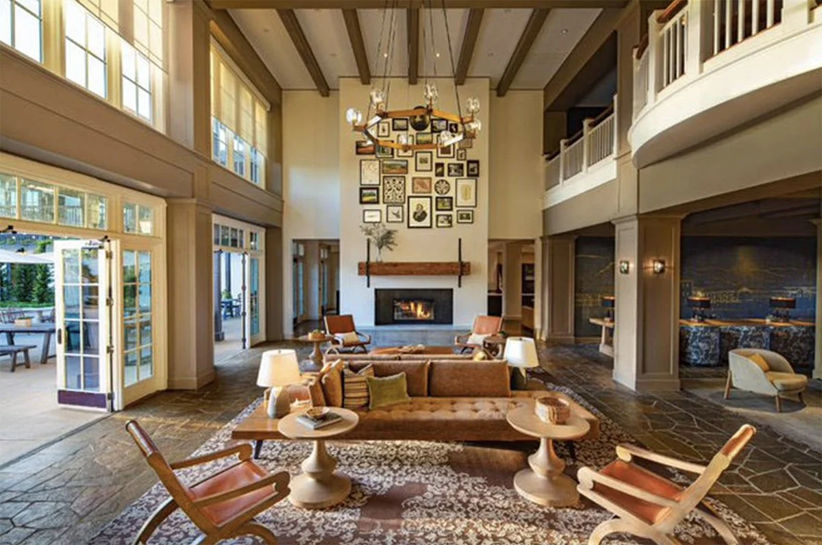 lodge sonoma with sette, lounge chairs, and decorative feature gallery wall art above fireplace