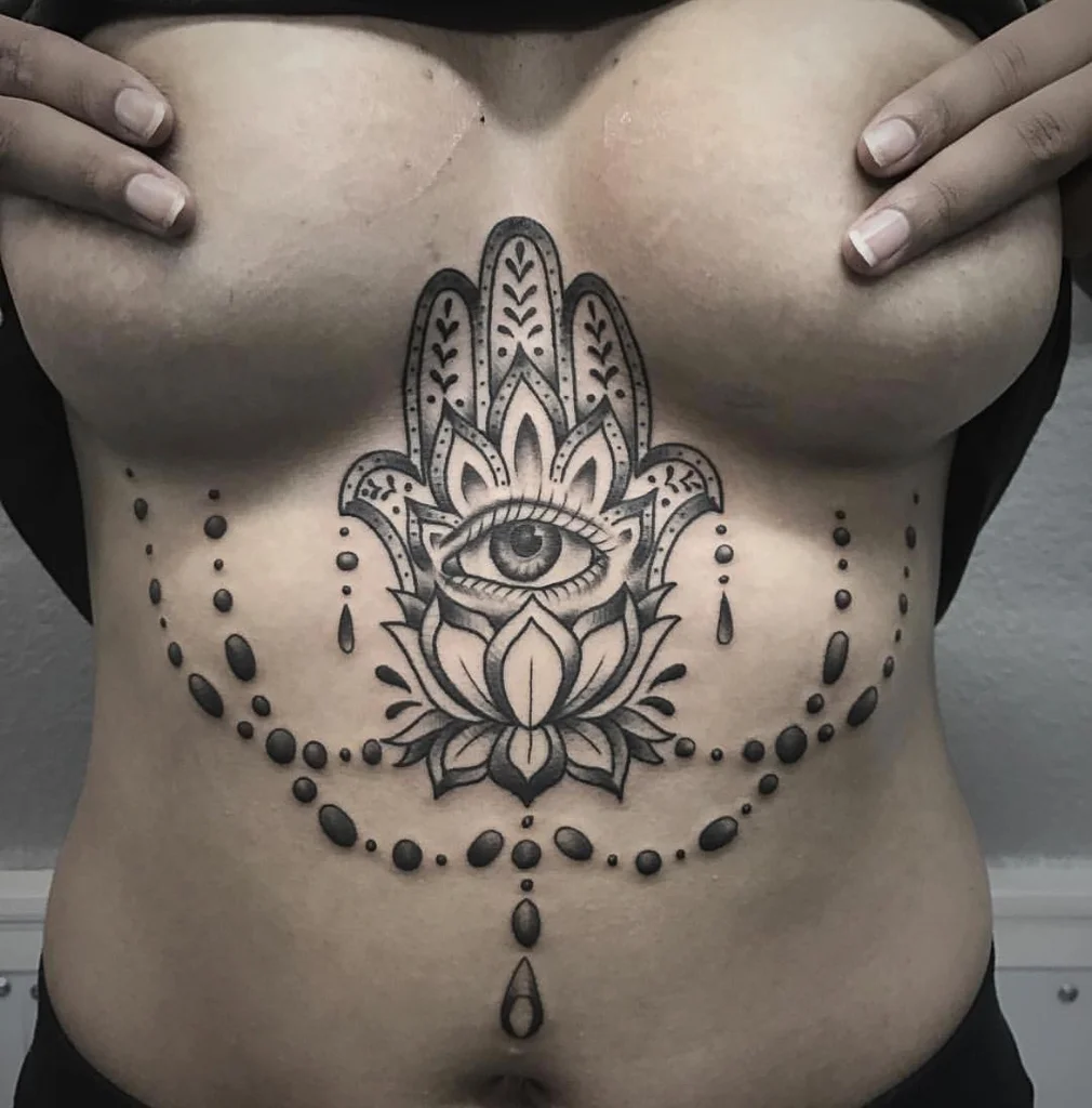 Custom-dotwork-underboob-tattoo-by-Jon-Hanna-at-Certified-Customs-Denver-CO.jpg