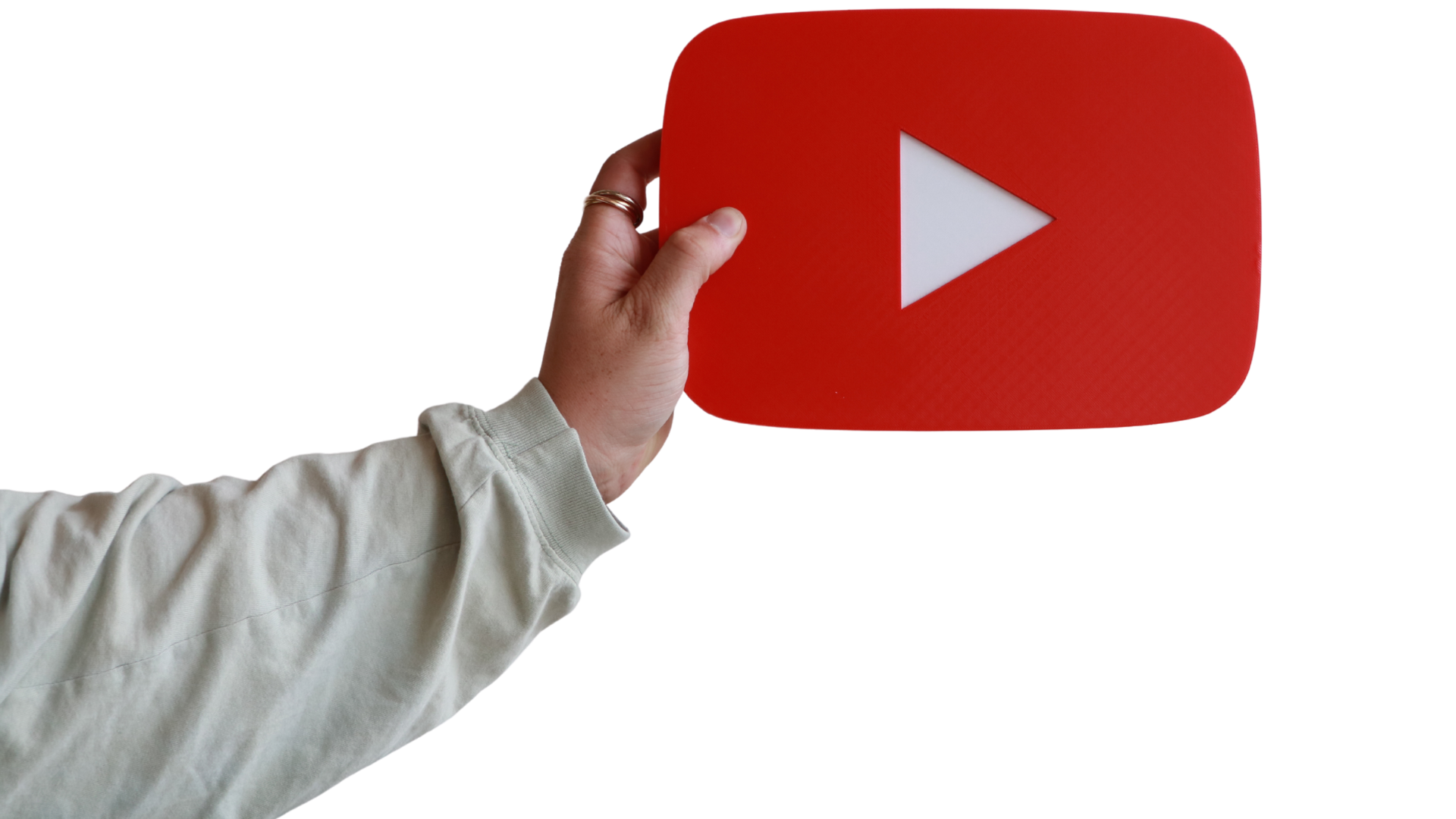 A person holding a large, stylized YouTube play button icon.