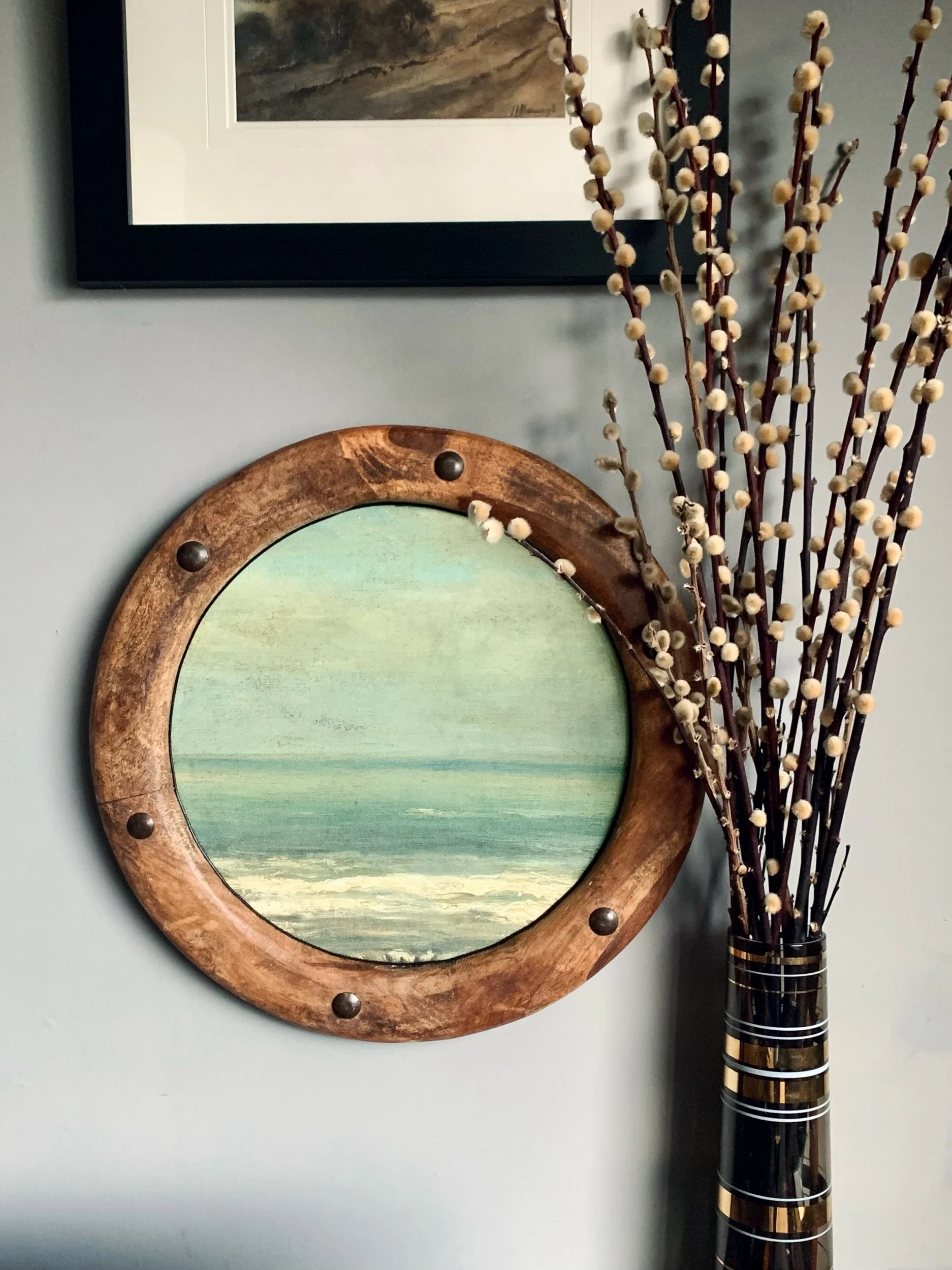 wooden porthole seascape.jpeg