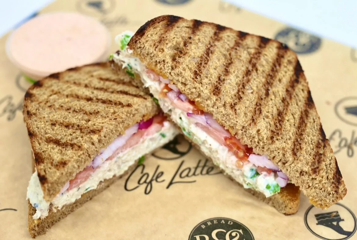 Tired of planning lunches? Stop in to Bread &amp; Chocolate! We have a wide variety of breakfast sandwiches, paninis, &amp; sandwiches served all day! 

Pictured above is a tuna melt on wheat with tomatoes, red onion, cheddar jack, &amp; our housemad