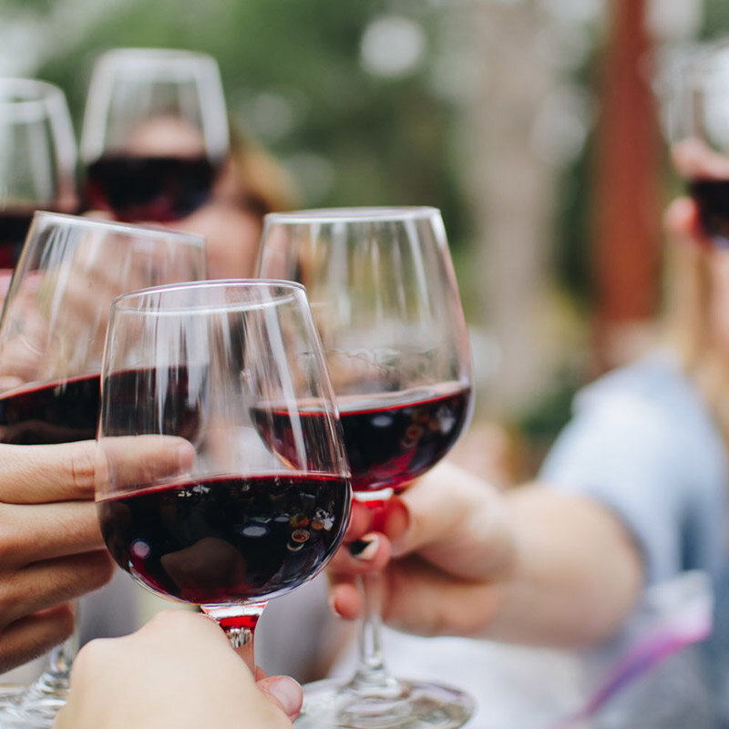 people-toasting-with-wine-glasses.jpg