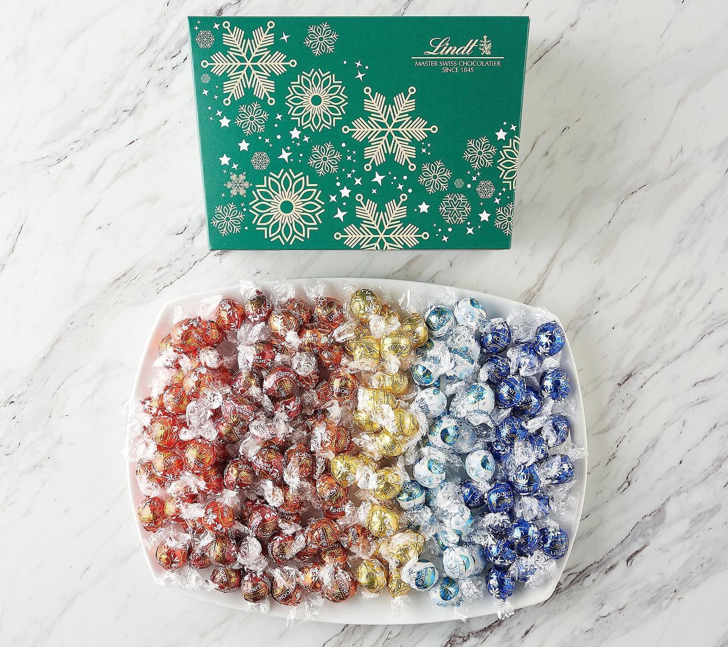 Always fun to see designs come to life 🤗 - especially when featured on TV! 

These boxes were designed exclusively for Lindt Chocolate to be featured on QVC - Christmas in July special ❄️🎁

#tistheseason #christmasinjuly #lindtchocolate #packagingd