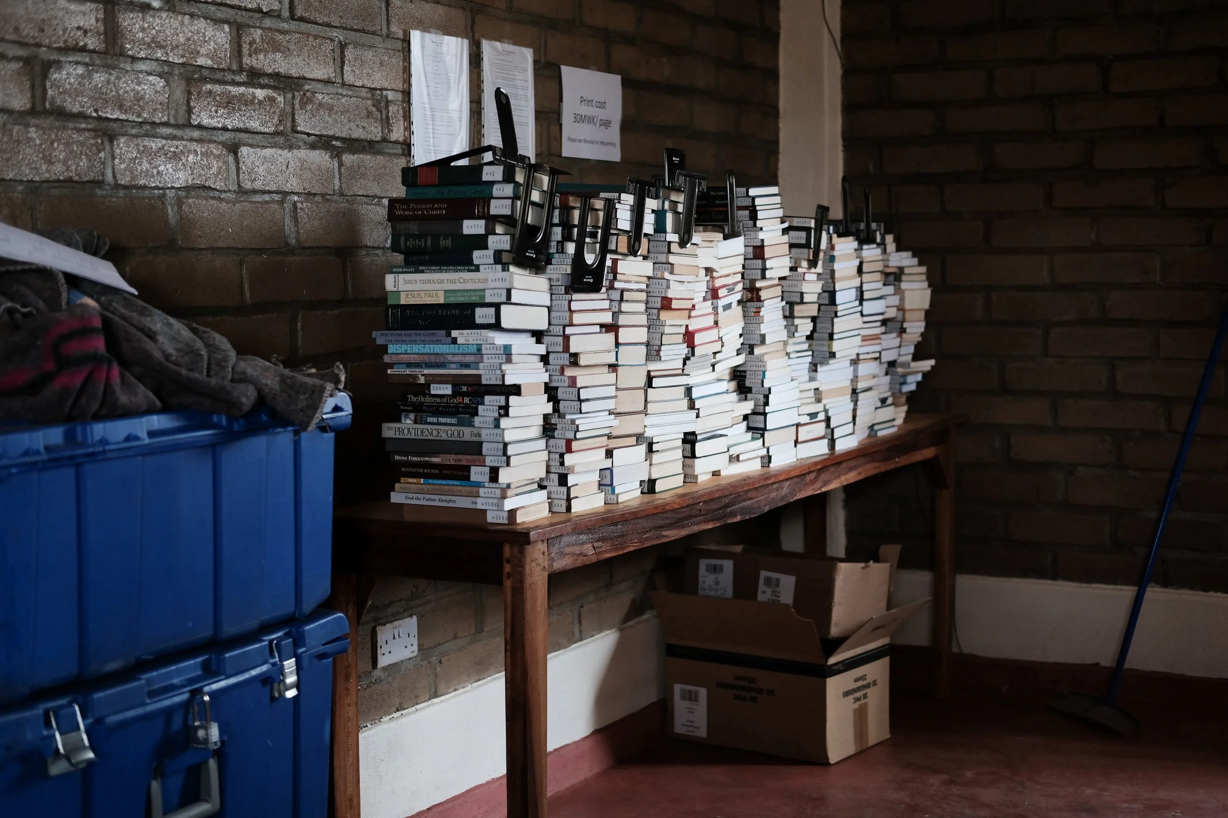 Because of the large number of books in CAPA’s library, every table in the classroom was needed to hold all the stacks of material.