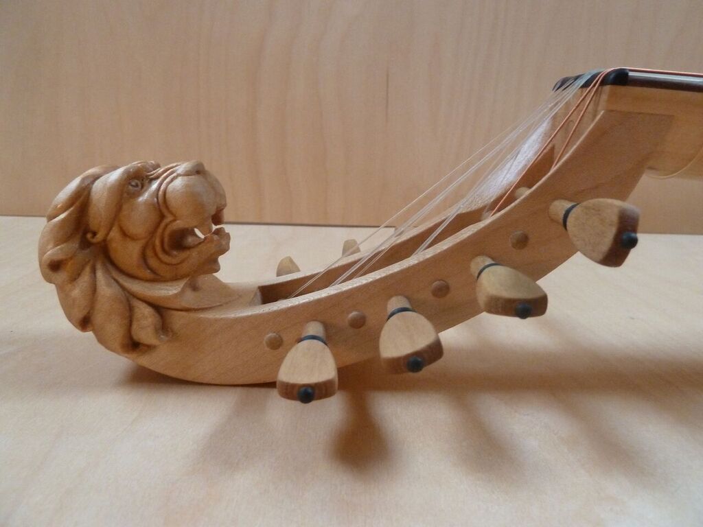 Gittern carved lion head pegbox_preview.jpeg