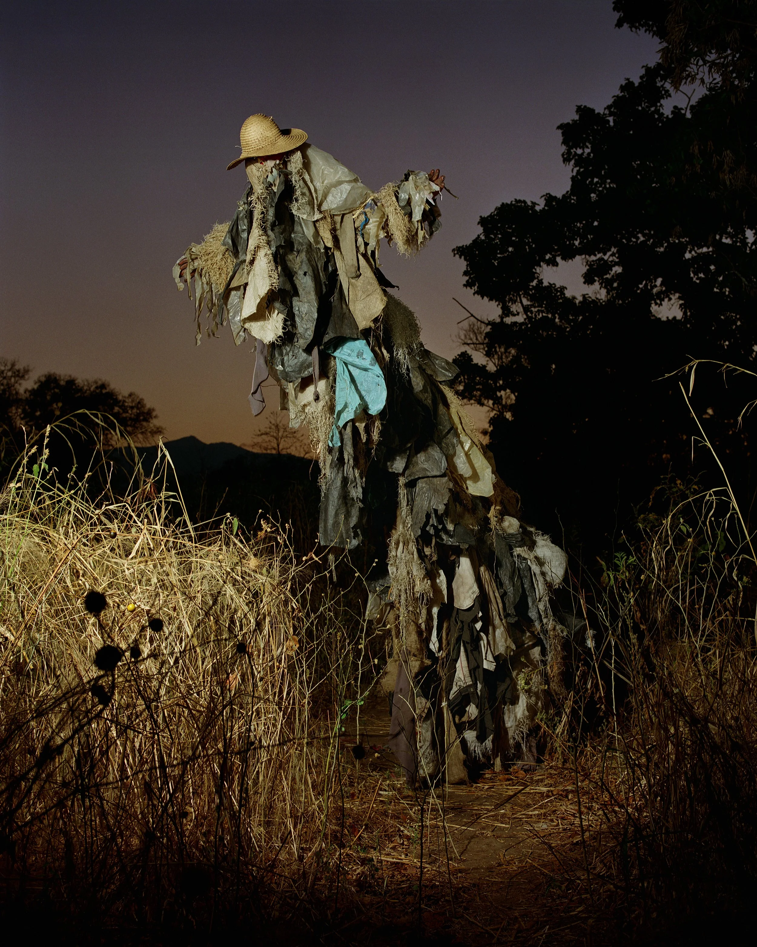"Mfiti Alaula" / 'the witch reveals itself"  It is the role of Gule Wamkulu and the masked spirit dancers to re-affirm the 'mwambo', the rules of culture that support harmony as custodians of the liminal world between the living and the ancestors of 