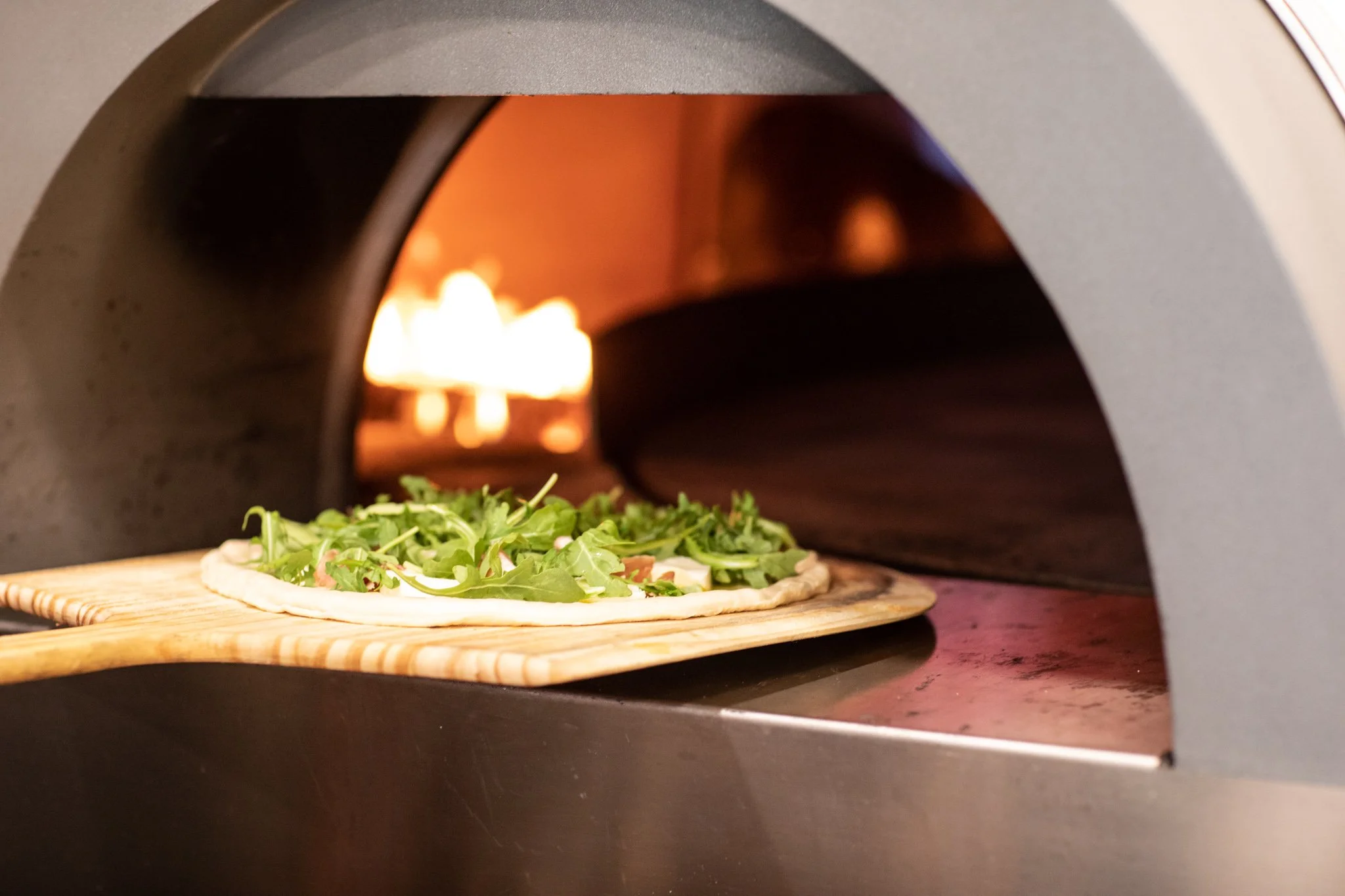 wood fired pizza in oven