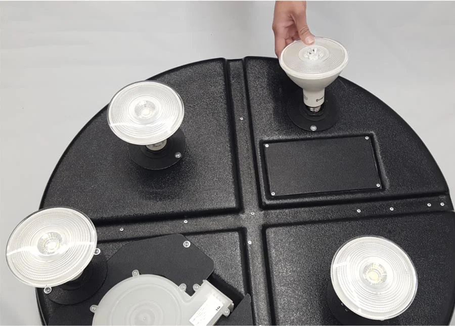1. While unplugged, screw in the provided LED bulbs