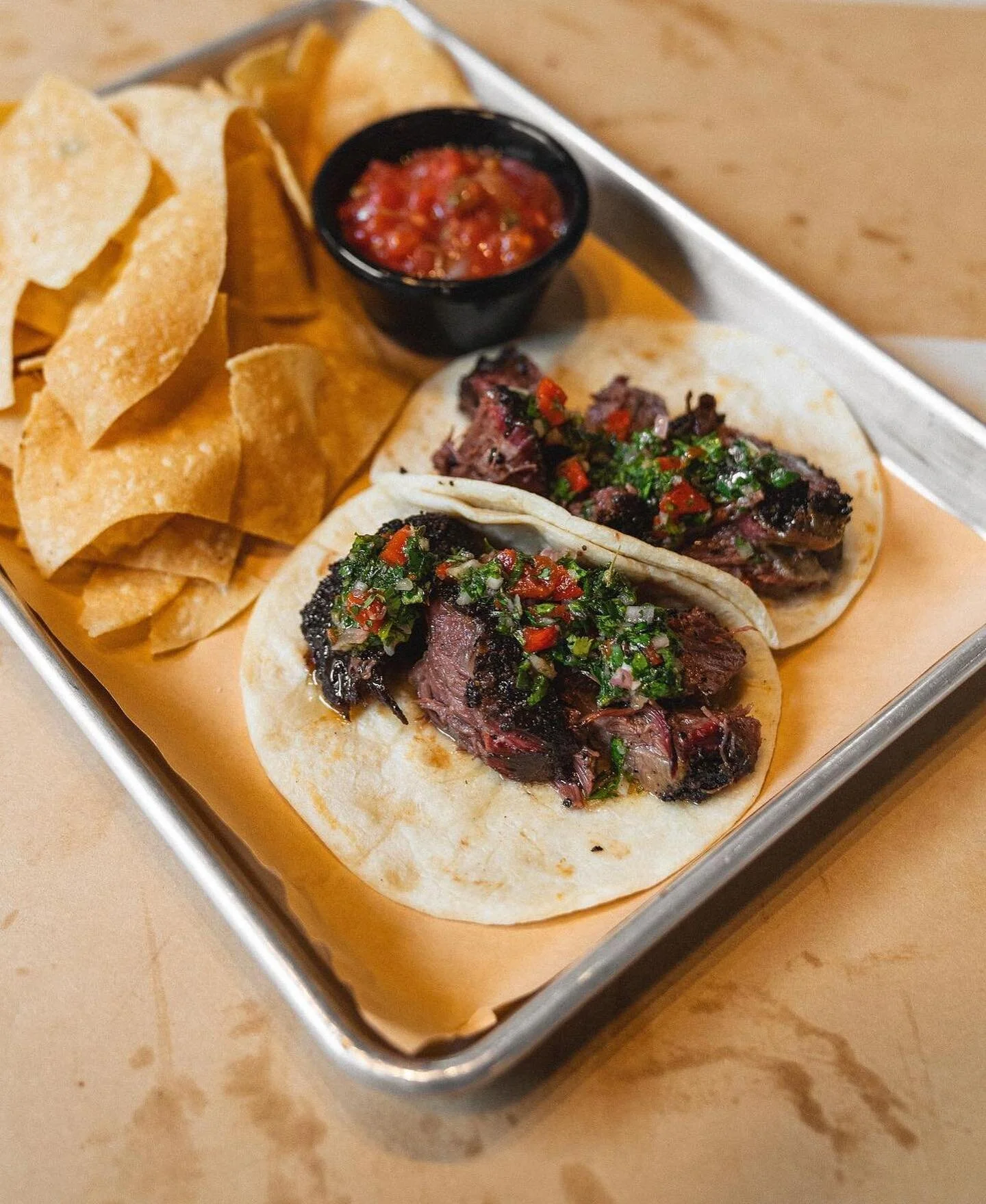 #TacoTuesday 🌮 spotlight on @jacksbbq whose rib beef tacos were featured in @seattletimes’ roundup of “The top 30 best tacos in Western Washington” — see you at Jacks BBQ in SLU this *Friday* to feast! 🔥 
“This is on