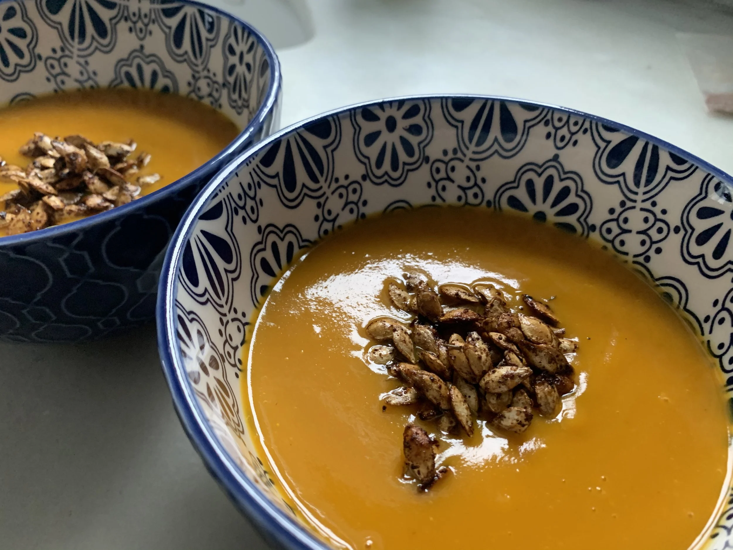 Roasted Winter Squash Seeds  atop  Squash Soup