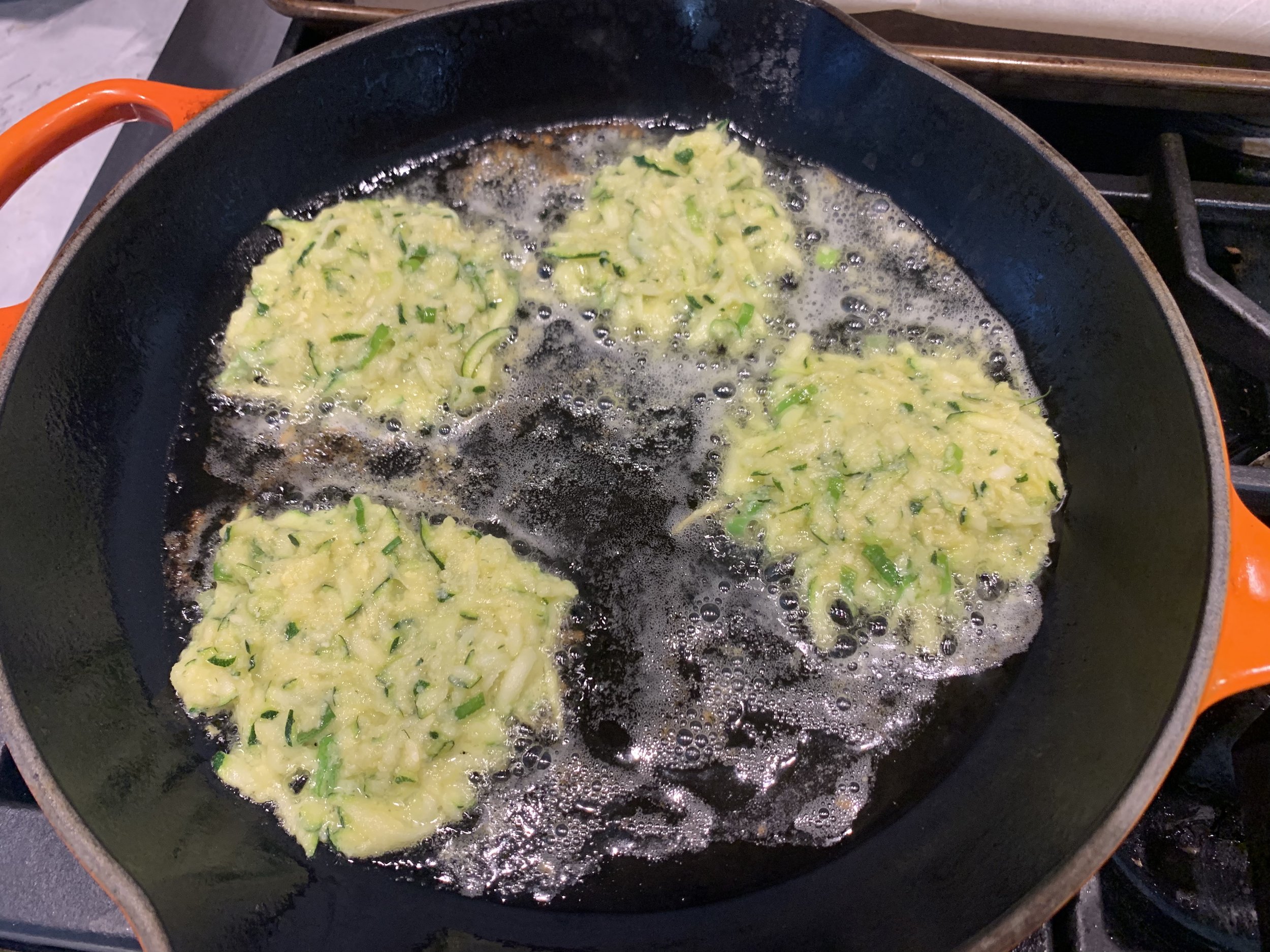 Salmon with Zucchini Fritters toped with Dill Sauce