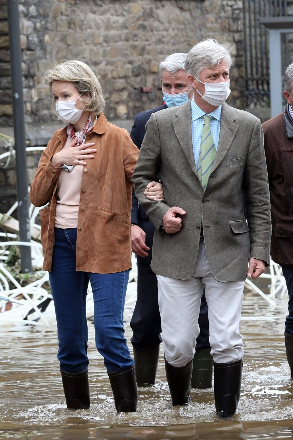 The King and Queen of the Belgians Inspect Flood Damages in Pepinster
