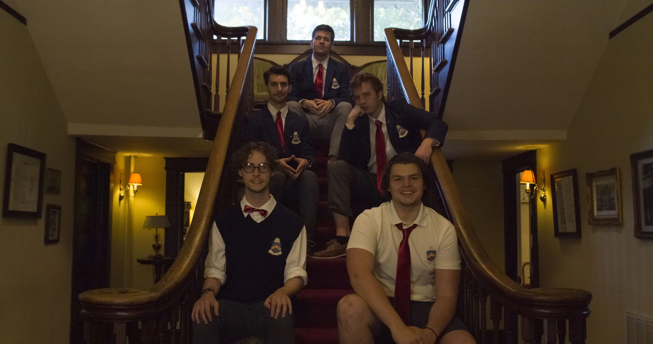 Frat Boys Stairs Sitting.jpeg