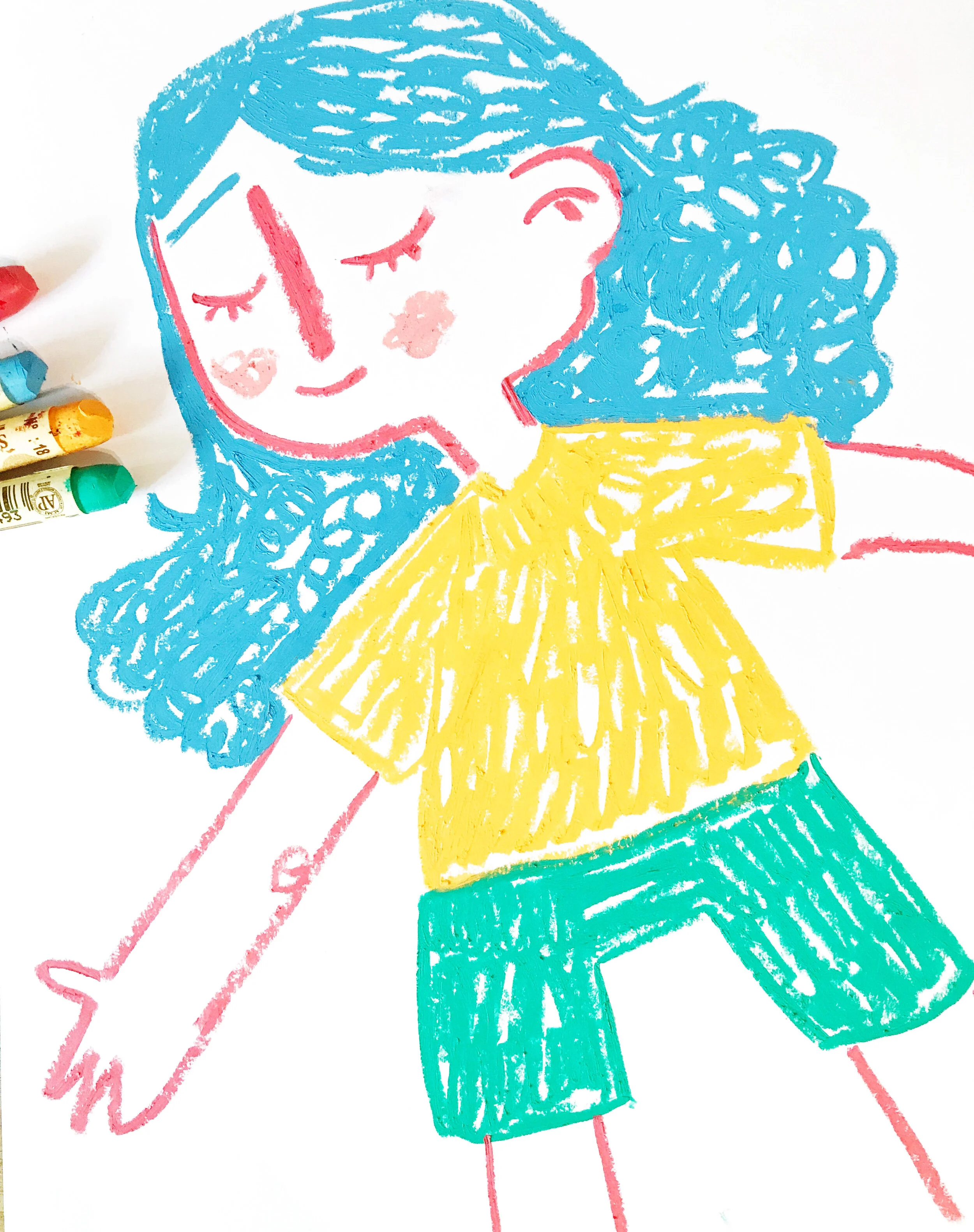 Children's drawing of a person with blue curly hair, closed eyes, wearing a yellow shirt and green pants, on white paper with crayons nearby.