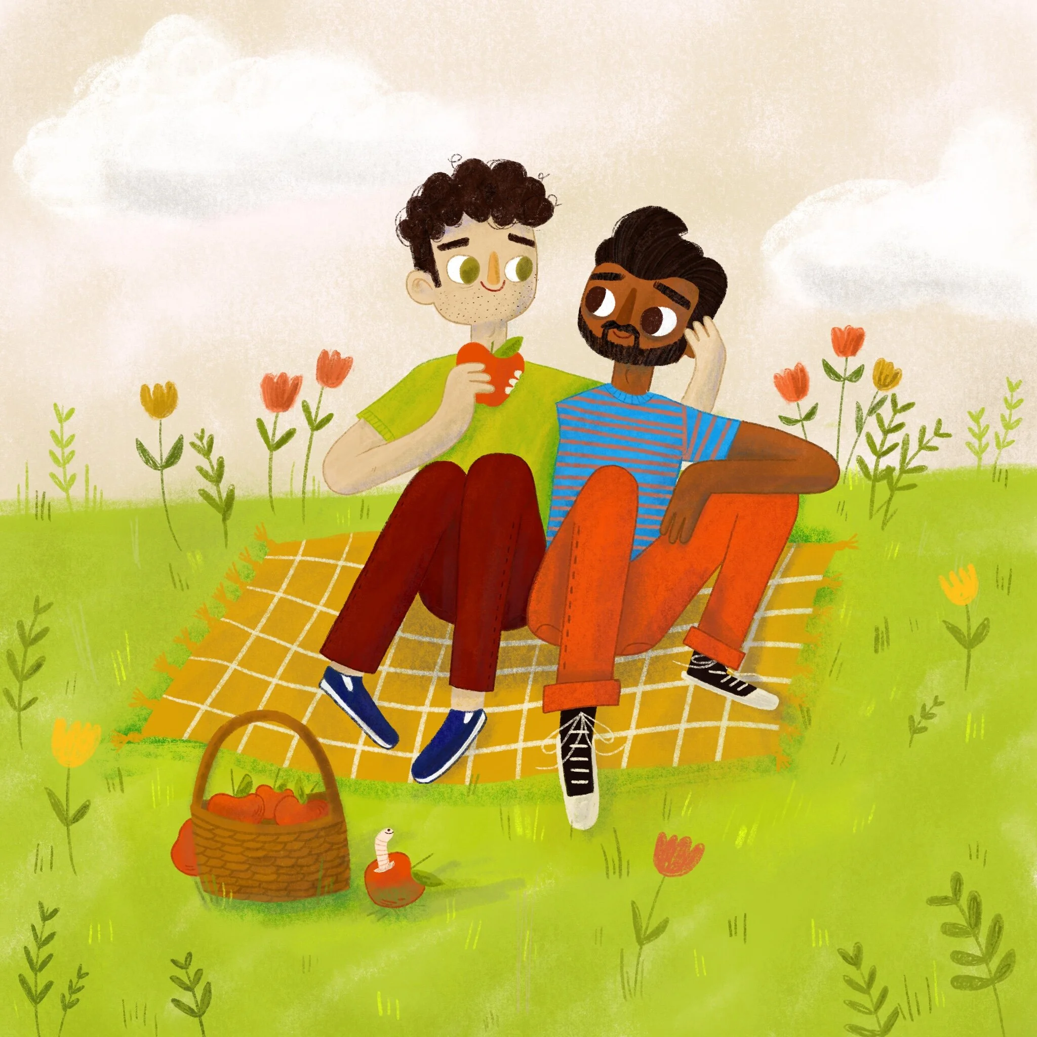 Two friends sitting on a picnic blanket in a grassy field with flowers, one holding a red apple, a basket of apples, and a worm in an apple on the ground.