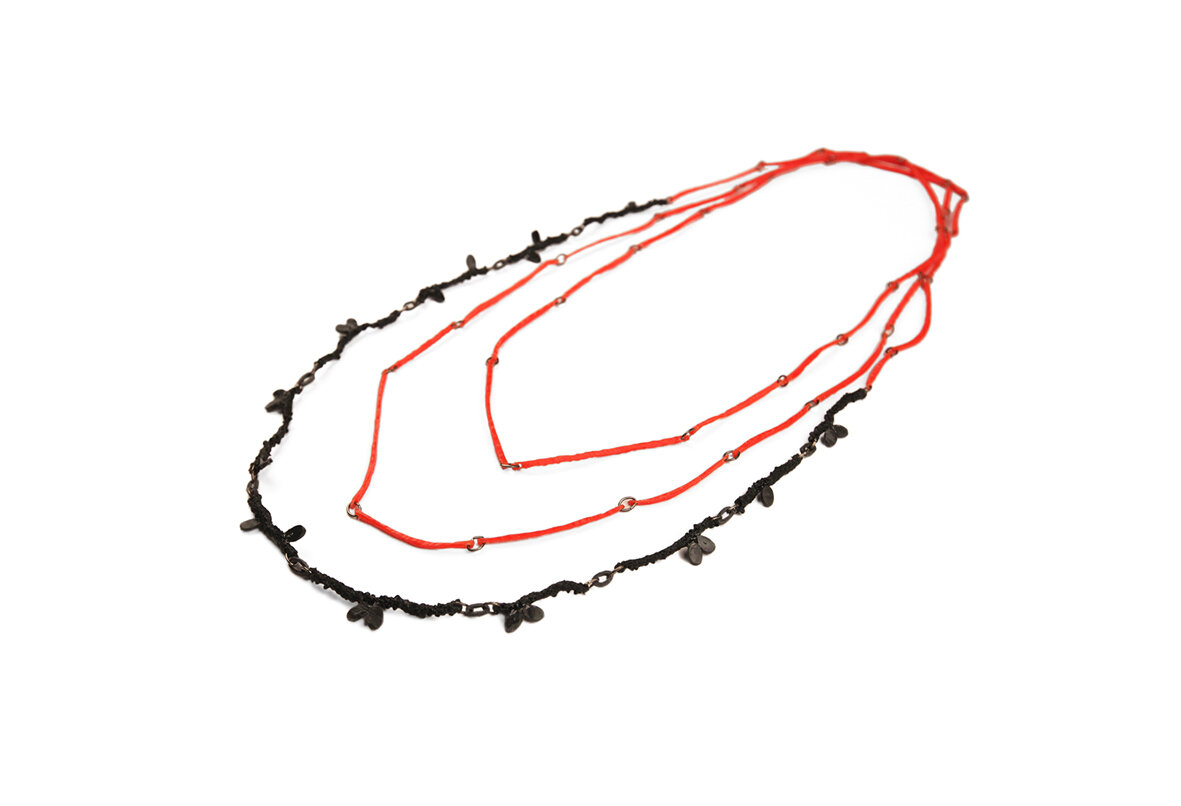 side view neckpiece worn debris collective.jpg