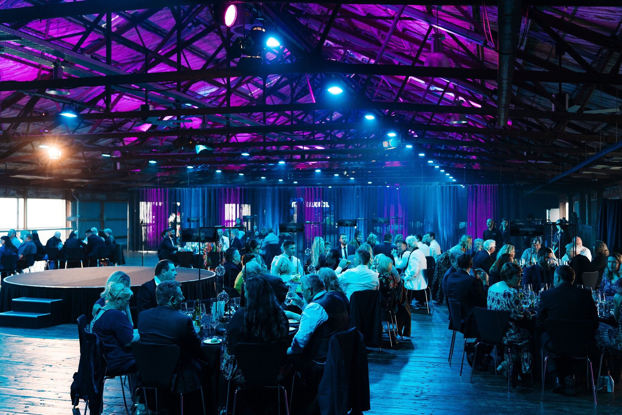 Great working with @motiveeventsnz again last week to put together this epic event for Mediaworks. The venue was split into 3 zones and we used the existing mesh curtain in Shed 10 to create some separation, whilst lighting it with our Fusion Bars fo