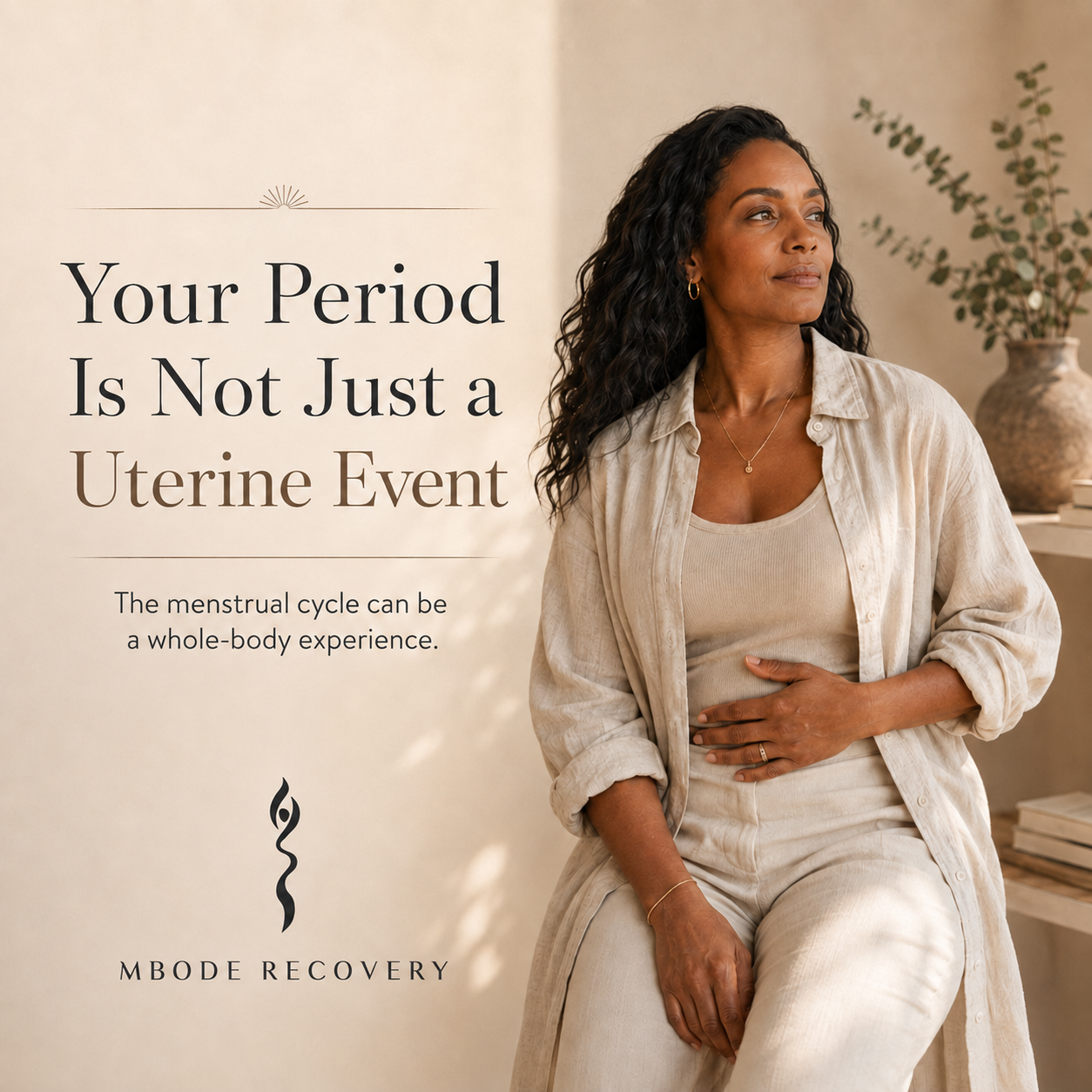 Woman resting a hand on her abdomen while experiencing period bloating and menstrual cycle symptoms