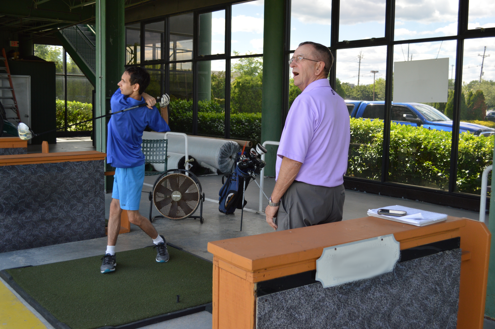 Walt Baker reacts to one of Arthur’s long drives