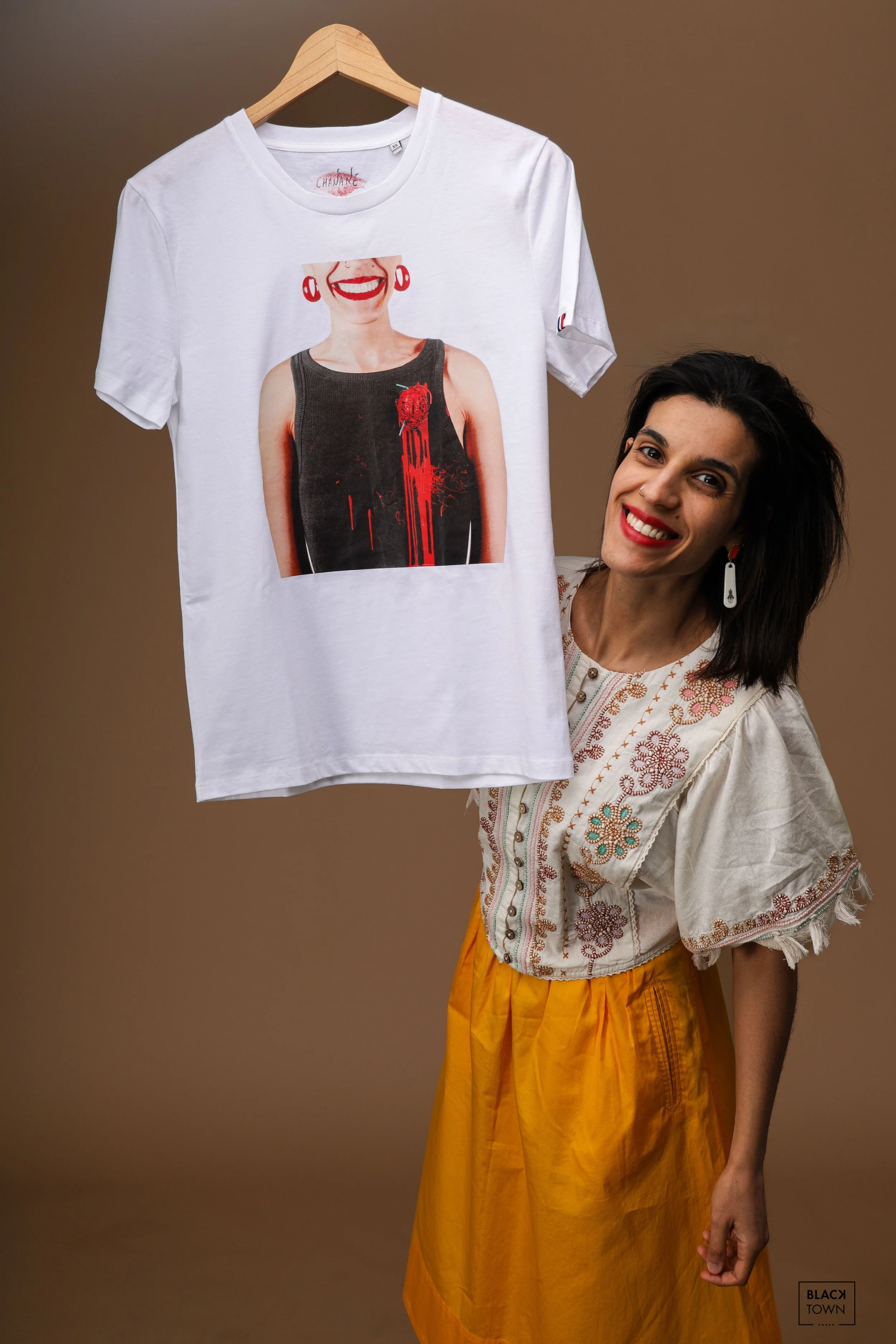Creative portrait of a designer with her work. Photo shoot for creative entrepreneurs, artisans, and brand launches.