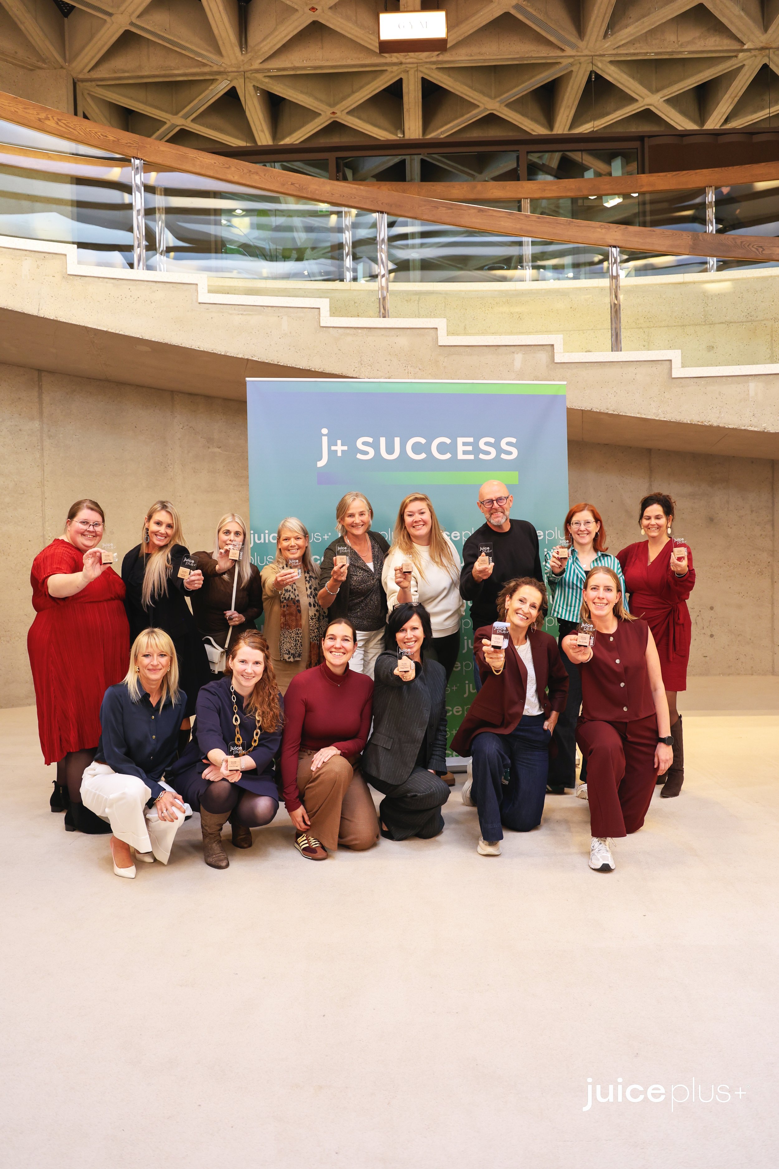 A festive group photo taken at an annual company gathering. Coverage of B2B events, incentive programs, and team-building activities in Brussels.