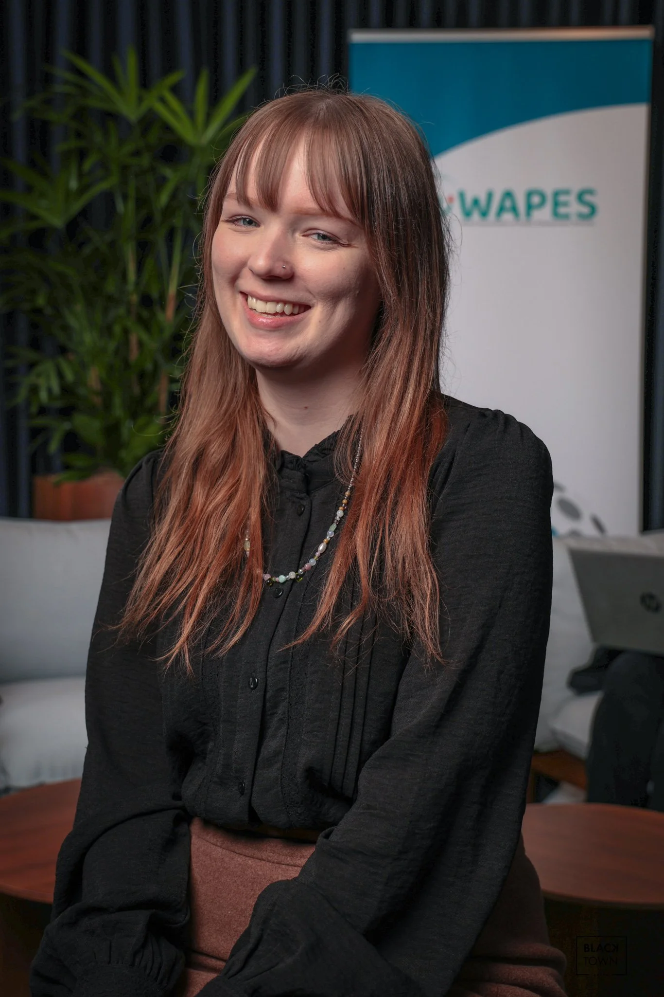 Personal branding photography for a female entrepreneur. Relaxed lifestyle portrait of a red-haired woman, perfect for LinkedIn and professional bios