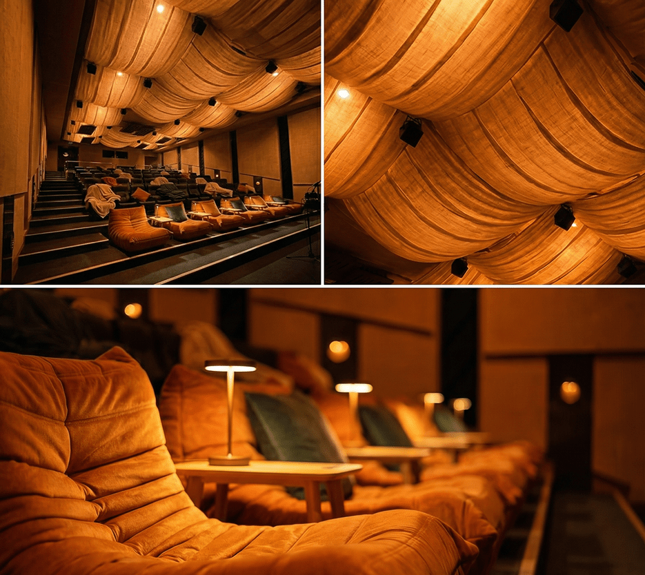 The Polygon Portal listening room: tiered lounge seating in orange, draped fabric ceiling with speakers, and low table lamps between the seats