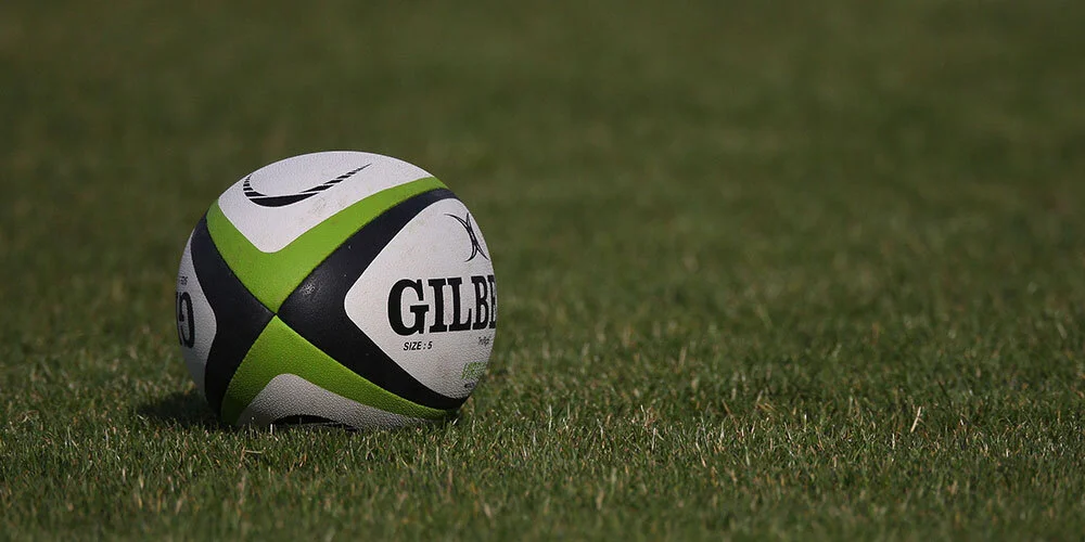 gilbert-rugby-ball-on-field.jpg