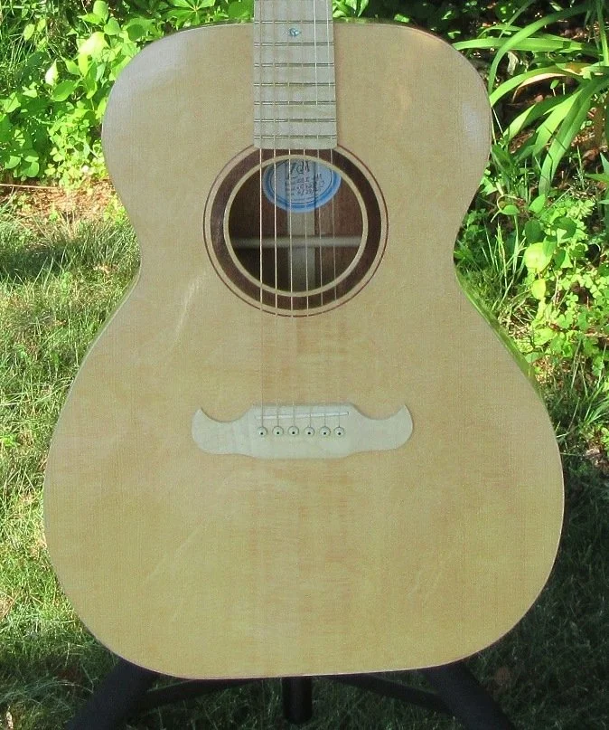 Sitka Spruce top with bearclaw figure