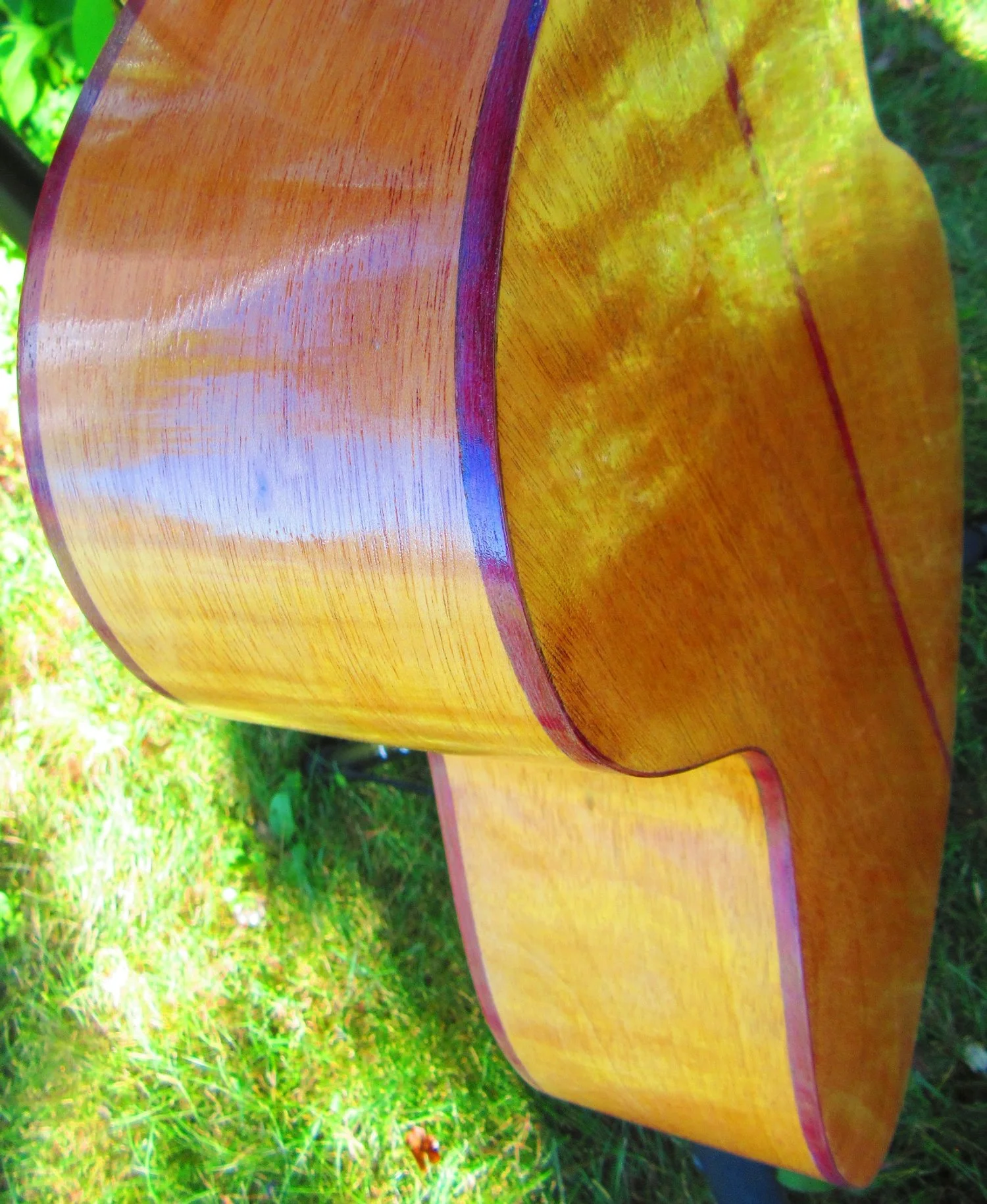 genuine Honduran Mahogany side with Purpleheart binding
