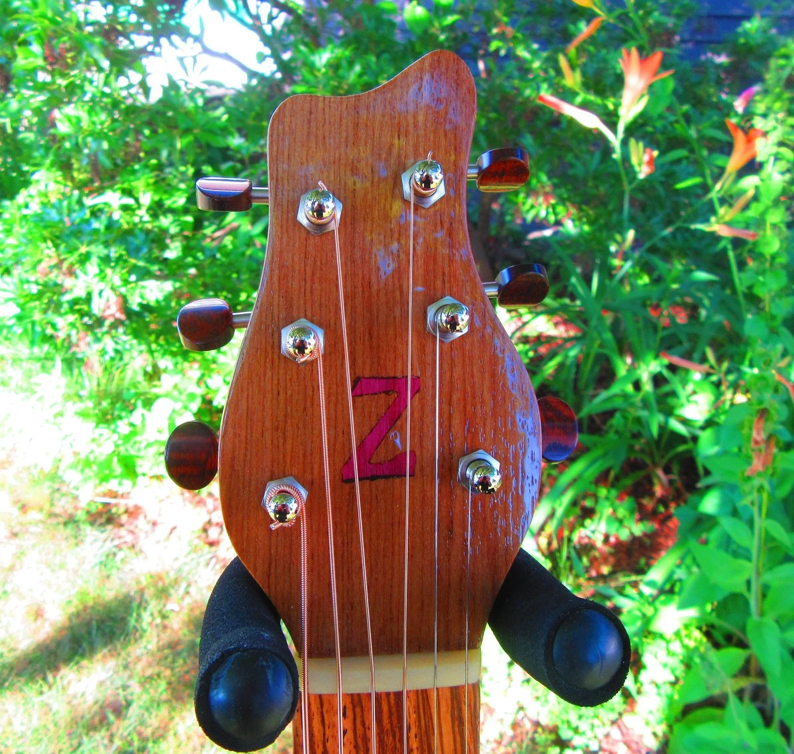 Teak peghead overlay with Purpleheart "Z"
