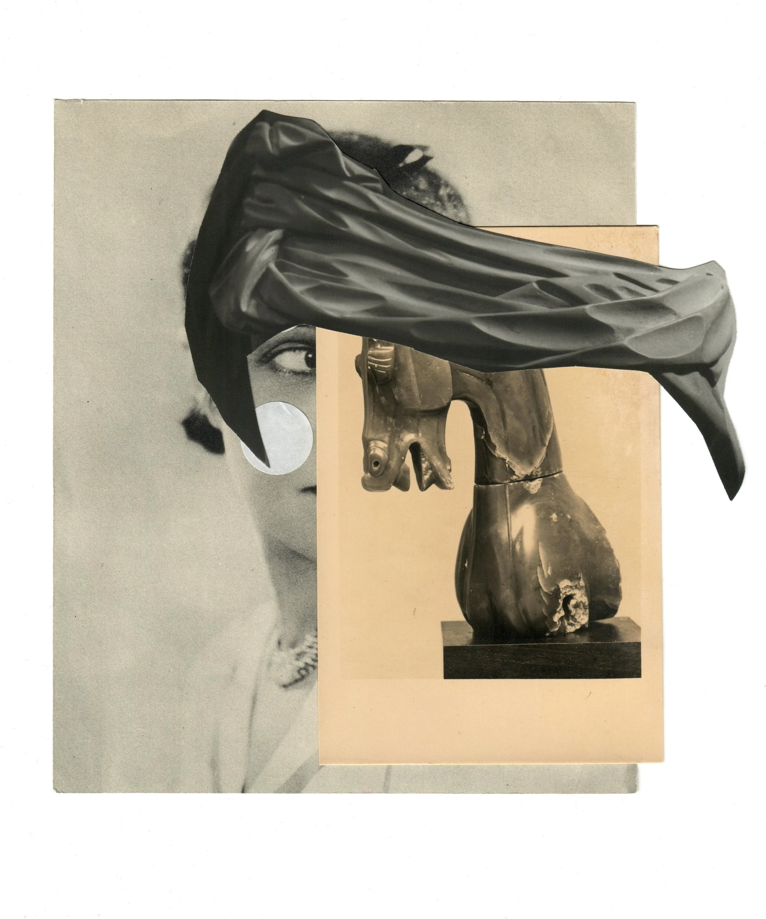 Black and white postcard collage with carved horse, fabric swathe and female