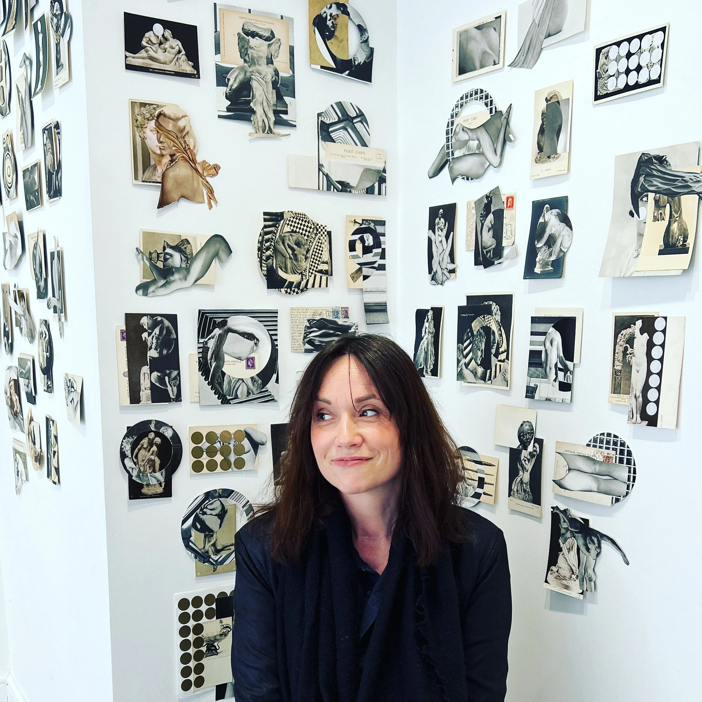 Artist Alex March in front of a display of collage artwork from Missive 2022