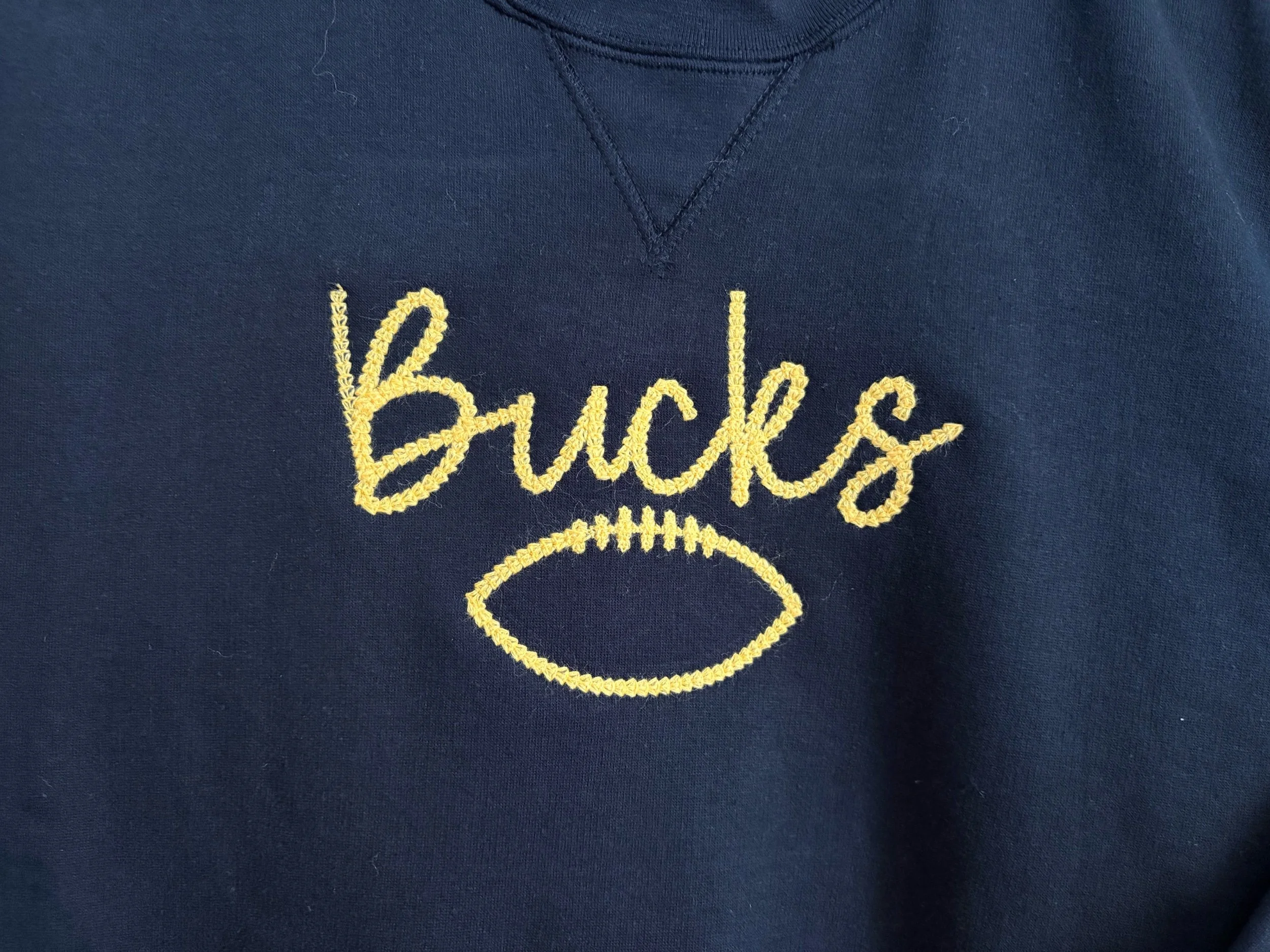 Bucks Football Chainstitch Pennant Crewneck Black 700