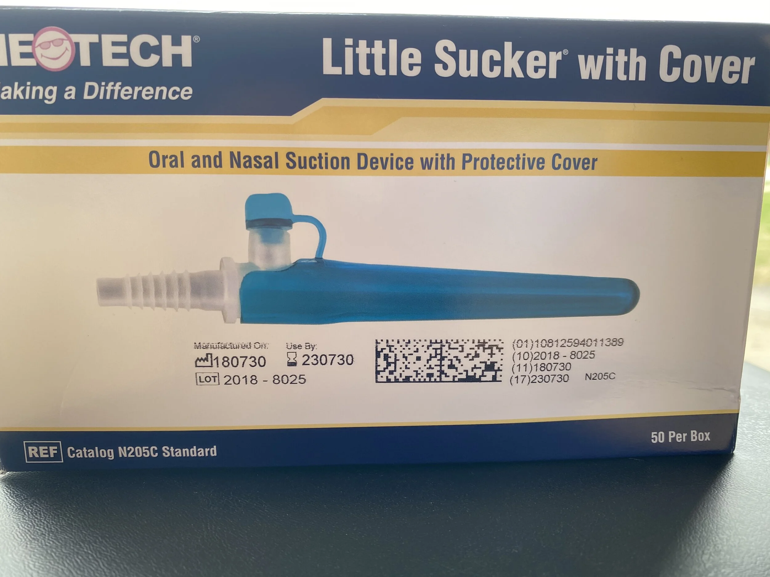 Oral and Nasal Suction Device with Protective Cover.JPG