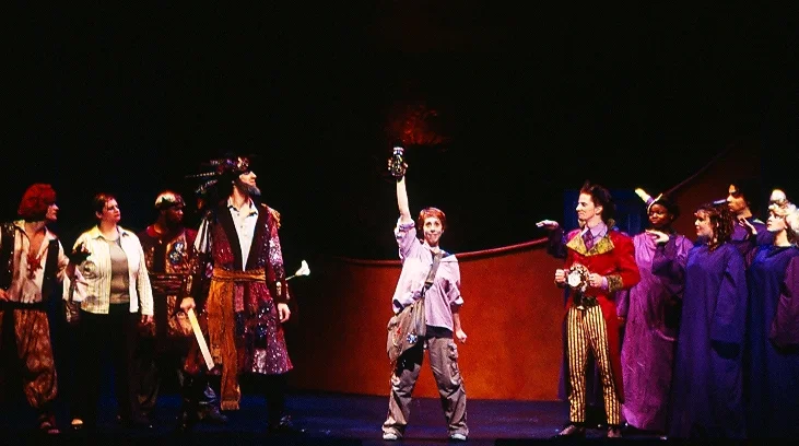 The company of Elliot and the Magic Bed ; Pittsburgh Playhouse Jr. Company. Photo: Drew Yenchak.
